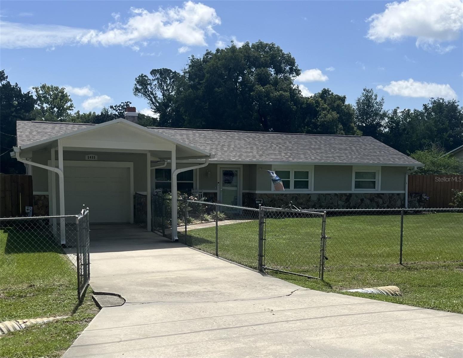 For the growing family. Come and see this beautiful completely remodeled ranch style home that is in move in ready. 3  Bedrooms Two baths (remodeled) New Kitchen and roof in 2026, A/C in 2019,all new windows in 2022,And so much more. Enjoy your Out door activities in the completely fenced in beautifully landscaped yard. Front yard has chain link Fence while the Back is totally private so you can enjoy your morning coffee in the lanai. Don't just drive by, make an appointment to come and see for yourself.