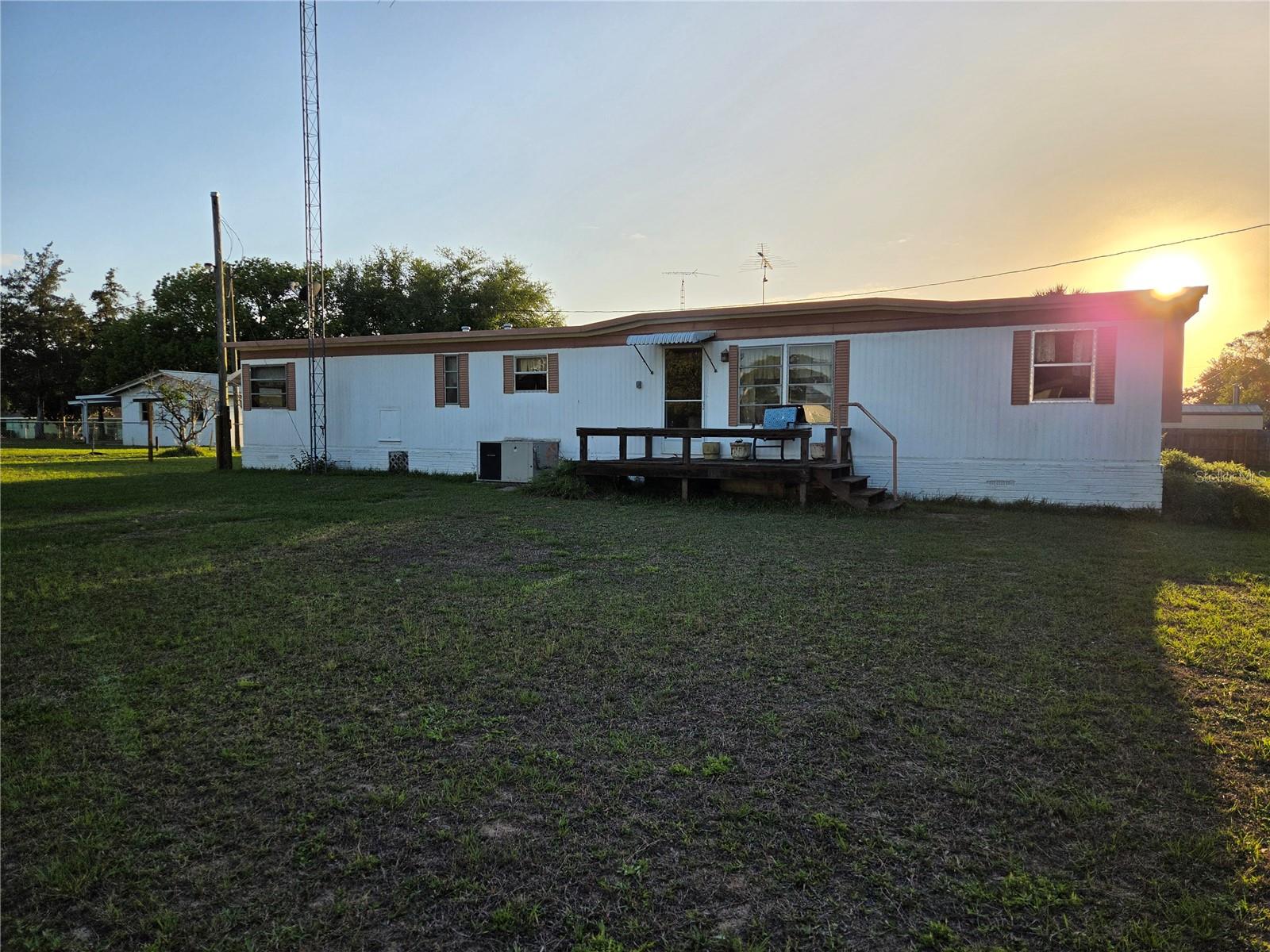 Move-in ready 2-bedroom, 2-bath manufactured home sits in the heart of Ocklawaha — one of Marion County's best-kept secrets — where bass fishing, bald eagles, and breathtaking sunsets are just part of everyday life. With water views right from home and quick access to Lake Weir, this is Florida living the way it was meant to be: relaxed, affordable, and close to nature. Whether you're looking for a full-time residence, weekend getaway, or peaceful retirement retreat, this property checks every box without breaking the budget. Just minutes from The Villages, Ocala, and Carney Island Recreation Area. No stress, no fuss — just pack your fishing poles and come home.