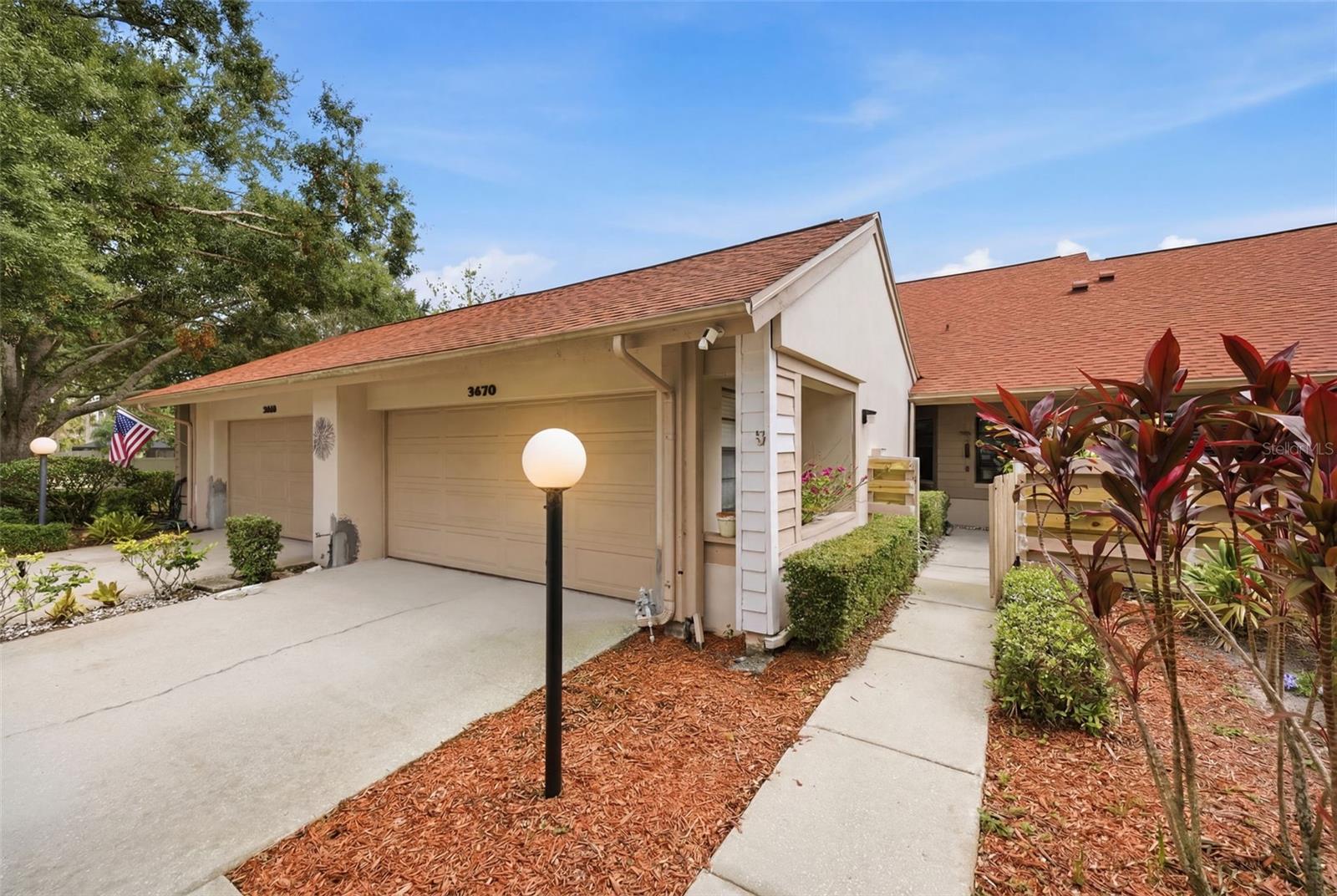 Some neighborhoods simply feel different the moment you arrive, and Imperial Ridge is one of them. Beneath a canopy of majestic oak trees, tucked quietly within the highly sought after Countryside North area, sits one of Clearwater’s best kept secrets, an intimate community of only 42 one-story villas where homes rarely become available and neighbors tend to stay for years.

For one lucky buyer, this is more than a home. It is an opportunity to become part of a lifestyle and community that is incredibly hard to find.

Entering through the private fenced courtyard and covered front porch, you immediately sense the warmth and charm this home offers. Inside, soaring vaulted ceilings and an abundance of natural light create an inviting sense of openness, while the thoughtfully designed split-bedroom floor plan allows privacy and comfort for both family and guests. The spacious primary suite feels like a peaceful retreat with its oversized walk-in closet and ensuite bath.

At the center of the home, the beautifully updated kitchen shines with gorgeous new countertops, generous cabinet space, a breakfast bar, eat-in dining area, and large windows that fill the space with sunshine. The expansive heated and cooled Florida room adds exceptional flexibility and easily becomes the favorite room in the house. Whether used as a reading room, fitness space, home office, hobby area, or a relaxing place to sip coffee with the windows open, it seamlessly blends indoor comfort with peaceful backyard views and privacy fencing.

The 2-car garage features storage cabinets for added organization and functionality, while a whole-home surge protector and security system adds another layer of everyday peace of mind.

This home has also been maintained with major updates already completed, including a 2023 roof, 2017 hot water heater, and HVAC system only 3 years old with ducts professionally cleaned annually.

Life in Imperial Ridge is about more than the home itself. Residents enjoy a gorgeous sparkling pool and cabana area, scenic tree-lined streets perfect for evening walks with neighbors and dogs, and a true sense of community among owners of all ages and backgrounds. Directly across from the entrance, the newest extension of the Pinellas Trail offers endless opportunities for biking, walking, and outdoor recreation. Freshly painted exteriors and fencing throughout the neighborhood continue to enhance the beautifully maintained surroundings.

And then there is the location. Just minutes to top-rated schools, Mease Countryside Hospital, shopping, restaurants, parks, Tampa International Airport, Clearwater Airport, and the world-famous Gulf beaches, this home offers the perfect balance of peaceful living and everyday convenience.

Opportunities like this do not come around often. For the buyer fortunate enough to call Imperial Ridge home, this is not simply a place to live. It is a place to settle in, slow down, connect, and truly enjoy the Florida lifestyle.