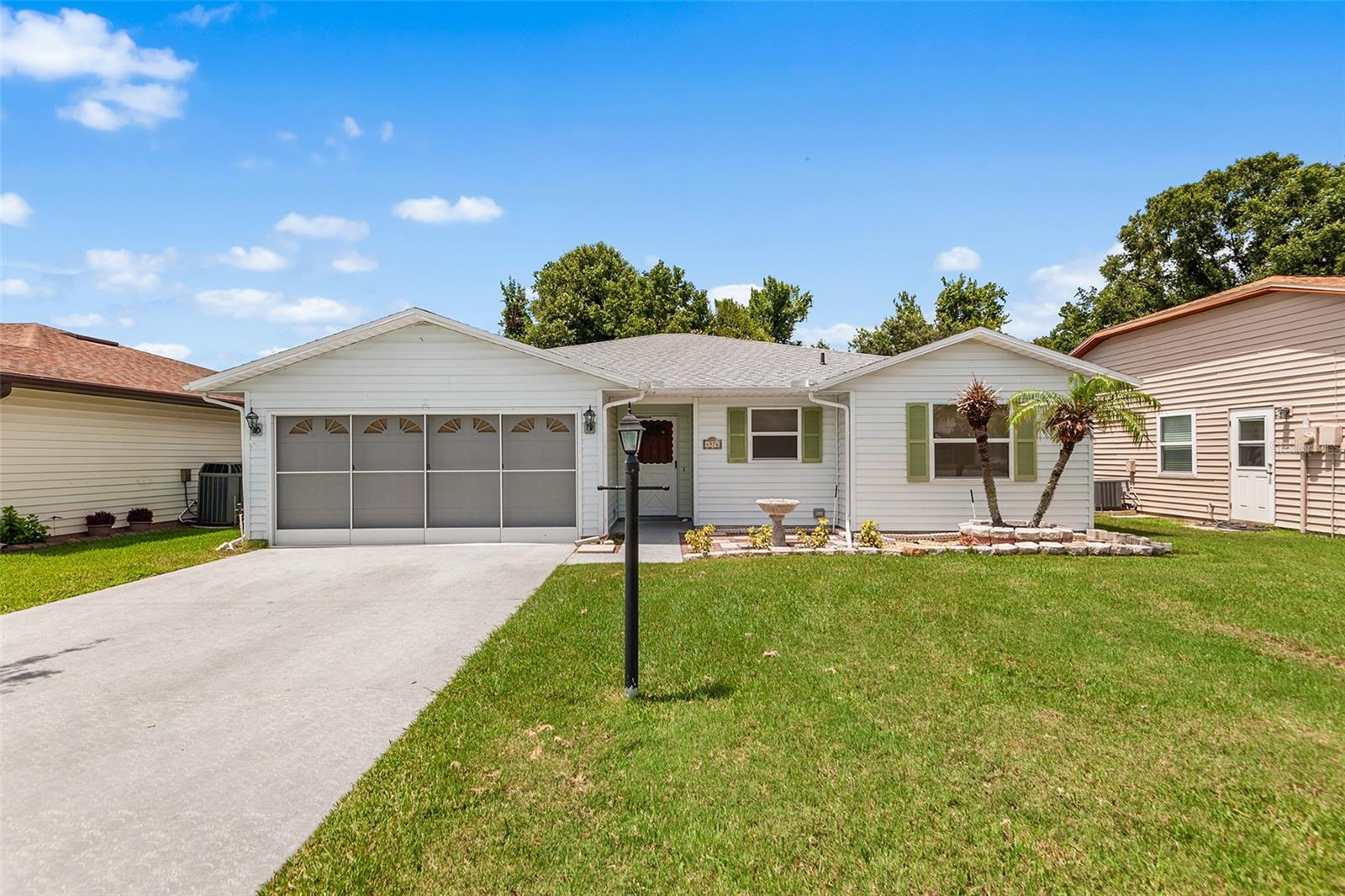 Move in ready 2-bedroom, 2-bathroom home located in the gated 55+ community of The Colonnades inSouth Lakeland. This home features an open floor plan with cathedral ceilings, tile flooring, aspacious kitchen with a breakfast bar and newer Samsung stainless steel refrigerator, and a tiledbonus room overlooking a wooded conservation area. The primary suite offers two walk in closets,dual vanities, and a walk-in shower. Additional features include an indoor laundry room, a two cargarage with a workbench and shelving, a screened and insulated garage door, and a private patiowith a retractable awning.The HOA includes lawn care, internet, basic cable, and access to the community pool, clubhouse,fitness center, library, shuffleboard courts, and dock. Conveniently located near the Polk Parkway, South Florida Avenue, shopping, dining, and Lakeland Linder International Airport. HOA approval is required