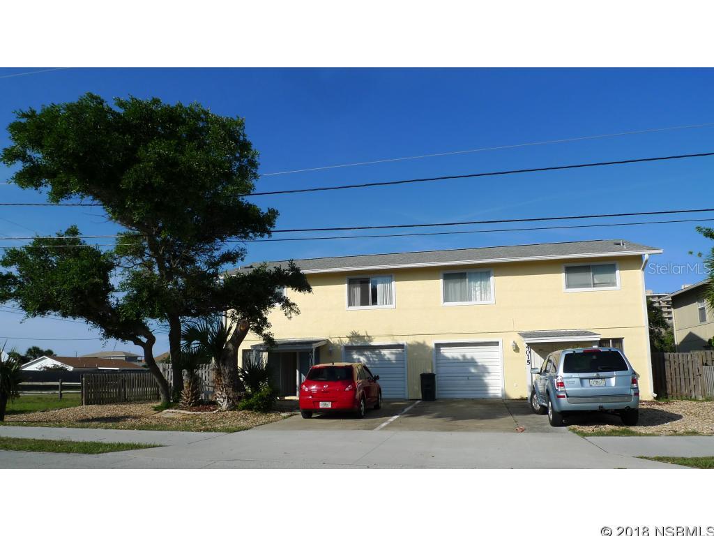 Conforming duplex with 2BR/2BA/1 car garage on each side. Ocean is a block away with 2 public accesses at 27th Ave and between Moontide & Seacrest condos.  Best of both worlds:  non driving beach South of 27th and driving beach North of 27th.  Tenants are on a month to month:  one pays on the first, the other on the 15th.  R-5 zoning allows for weekly vacation rentals. Walk to 2 parks (Indian River Lagoon and 27th Ave Beachfront Park).  Close to Dollar store shopping center, Coronado Elementary, 24 hour convenience store with gas station. Kayak in the Lagoon, surf in the ocean, or walk on the beach! Play squash or basketball at 27th Ave Park which offers bathrooms and showers, playground, picnic area. Lagoon Park has a scenic walking trail, pavillion with picnic area & restrooms, fishing dock, launching spot for canoes & kayaks.Life guard station at 27th Ave.Each unit has a laundry room. 2 electric meters. 2 water meters. 2 central A/C for 4015 and 3 window units for 4013(upstairs/downstairs). 1 outside shower. Central A/C for 4013 is in place but not working.Irrigation system in place with city water, pipes and sprinklers but is not operational. Garages have openers, A/C vent & washer/dryer hookup.All information is assumed accurate but not guaranteed.  Buyers and their agent to verify all information deemed important to them.Flood zone X according to Realist.