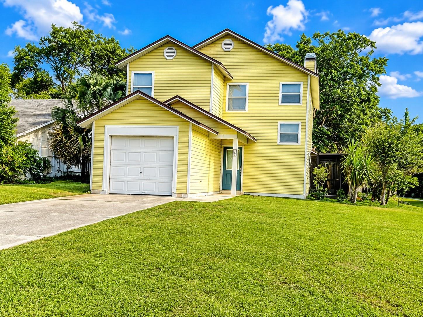 Welcome to 191 W 7th Street in Chuluota, where value, space, and freedom come together with no HOA restrictions. This two-story home offers 3 bedrooms, 2.5 bathrooms, bamboo flooring throughout, and no carpet. The spacious living area features a cozy fireplace, creating the perfect gathering space for family and friends.
The kitchen and living areas flow seamlessly to a large screened lanai overlooking the fenced backyard, providing plenty of room for entertaining, pets, gardening, or outdoor activities. Situated on a desirable corner lot, the property offers additional yard space and privacy.