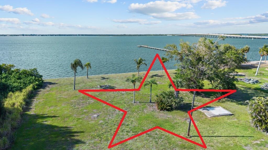 Instant Equity Opportunity!! Priced $125,000. below recent appraisal! Welcome to an extraordinary waterfront estate opportunity in the heart of Punta Gorda! Set on nearly 2 rare acres with approximately 200 feet of waterfront frontage and seawall, 26014 Shore Dr offers an unmatched combination of privacy, space, and panoramic water views that are becoming increasingly difficult to find in Southwest Florida. This remarkable property provides the ideal setting to create a true coastal retreat, with endless possibilities for outdoor living, boating, and entertaining.

For fishing enthusiasts, this location is a dream come true. Enjoy direct access to some of the area’s most sought-after fishing waters, known for incredible catches of snook, redfish, tarpon, and trout right from your backyard or just minutes away by boat. Whether you enjoy early morning casts from your seawall, sunset cruises, or full days on the water, this property delivers the ultimate Florida waterfront lifestyle.

The expansive nearly 2-acre homesite offers a level of privacy and open space rarely available in Punta Gorda waterfront properties. With approximately 200 feet of seawalled waterfront, there is ample room for docks, lifts, outdoor entertaining spaces, additional garages, guest homes, or creating your own private tropical paradise. The wide water views and breathtaking sunsets create an unforgettable backdrop every single day.

Located just minutes from vibrant downtown Punta Gorda, you’ll enjoy easy access to award-winning waterfront restaurants, boutique shopping, live music, farmers markets, marinas, parks, golf courses, and the scenic Harborwalk. Downtown Punta Gorda is beloved for its charming coastal atmosphere, boating culture, and endless year-round events that make it one of Southwest Florida’s most desirable destinations.

Rarely does a property offer this much land, extensive waterfront frontage, exceptional fishing access, and close proximity to downtown Punta Gorda all in one package. 26014 Shore Dr is a truly unique opportunity to own a premier piece of Southwest Florida waterfront paradise.