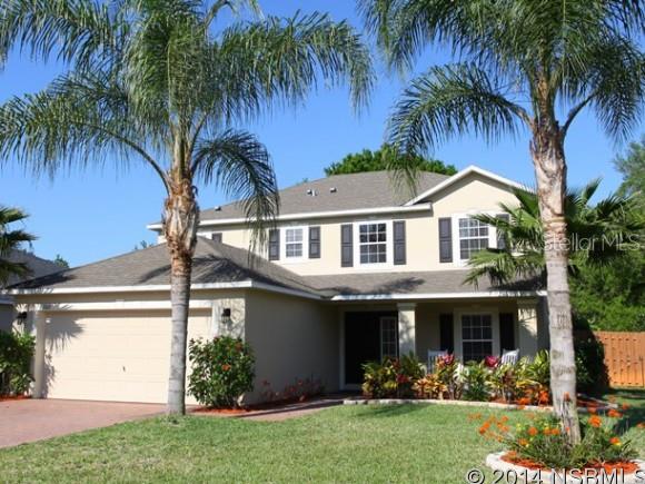 This gorgeous, well- built Maronda home was constructed in 2009 and lovingly maintained by its original owners.  Offering seclusion in a convenient neighborhood setting, this home backs up to an open conservation area lined with mature trees.  The large covered southern- style front porch invites you into the grand foyer.  Tile throughout the first floor common areas and laminate in dining and living rooms gives the home fresh relaxing feel.  The chef will enjoy the conveniently laid-out kitchen with granite counter tops and double deep sinks.  There is plenty of storage here with 2 walk-in pantries and a lighted closet.  Enjoy the backyard wildlife and lush landscaping from the large breakfast bar.  The secluded family room makes a great play room or guest room.  The upstairs loft offers another option for a play room or an office. The luxurious master suite has vaulted ceilings, 2 walk in closets and garden tub.  Bedroom windows offer pleasant views overlooking the conservation area. Two- car garage has garage door opener, pull down attic stars and carpeted attic.  This home also comes with hurricane shutters and sprinkler system.  Convenient to 1-4, Embry-Riddle Aeronautical University, Daytona International Airport, hospitals, shopping library and parks.  Look no further.  This home has it all. ;Water: City