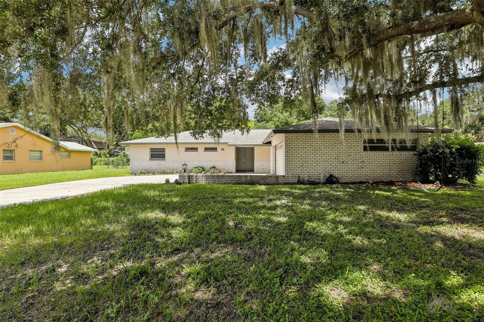 Charming corner-lot single-family home for sale in the heart of Kissimmee! This spacious 3-bedroom, 2-bathroom home offers 1,745 square feet of living space on a generous 0.28-acre lot. The home has been well maintained and features a bright kitchen with stainless steel appliances, abundant storage, and natural light throughout. It also includes a two-car garage, central heating and air conditioning, and a cozy patio that opens to a huge backyard — perfect for outdoor gatherings or private relaxation. A new roof was installed in 2022, and the home is now vacant and move-in ready. Located on a quiet corner lot in the Cadillac Homes subdivision, this home offers solid construction, timeless charm, and a convenient location close to shopping, dining, and major roadways. Don't miss your chance to make this gem your own — schedule a showing today!