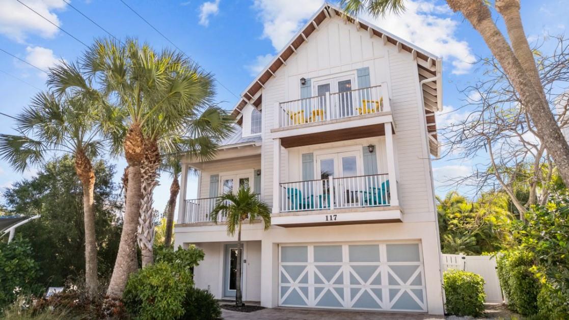 Exceptional island retreat located on beautiful Anna Maria Island, just one block from the beach and a short stroll to the charming shops and restaurants along Pine Avenue. This custom-built 2,000 sq. ft. home offers the perfect blend of coastal luxury and investment potential. Designed with an open-concept floor plan, the residence features 5 bedrooms, 3 1/2 baths, providing ample space for family and guests. The newly remodeled kitchen showcases high-end finishes and flows seamlessly into the main living areas, ideal for entertaining. Step outside to your private resort-style oasis featuring a luxury heated pool and spa with generous poolside seating, perfect for relaxing after a day at the beach. Additional highlights include a dedicated game room and a rooftop deck offering the perfect space to enjoy island sunsets and coastal breezes. Whether you are seeking a private second home or a strong income-producing investment property, this home delivers. With weekly rentals allowed, a 12-person occupancy, and a proven rental history, it offers excellent income potential. Being sold turnkey, this island property is ready for immediate enjoyment or continued rental success.