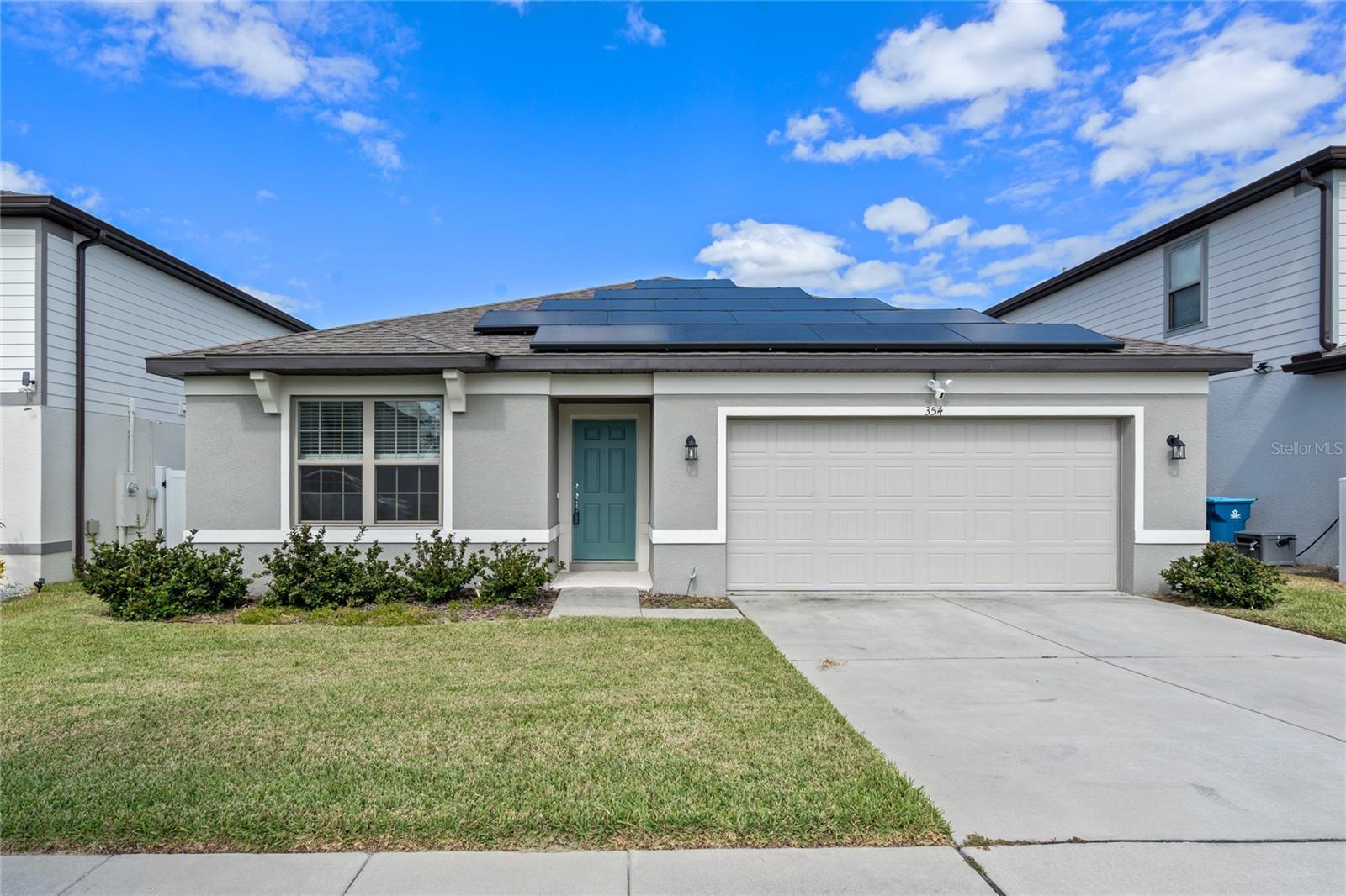 Welcome to your dream home in Davenport, FL! This stunning new home boasts four spacious bedrooms and two modern bathrooms. With the solar fully paid off, you'll enjoy energy-saving benefits and reduced utility costs. The large backyard is a green oasis, adorned with numerous fruit trees that provide both beauty and delicious harvests. Step inside and be greeted by the perfect blend of comfort and style with carpet and tile floors that create a cozy atmosphere. All the appliances are brand new, ensuring convenience and efficiency in your day-to-day life. Make this house your home and indulge in the luxurious experience it offers.