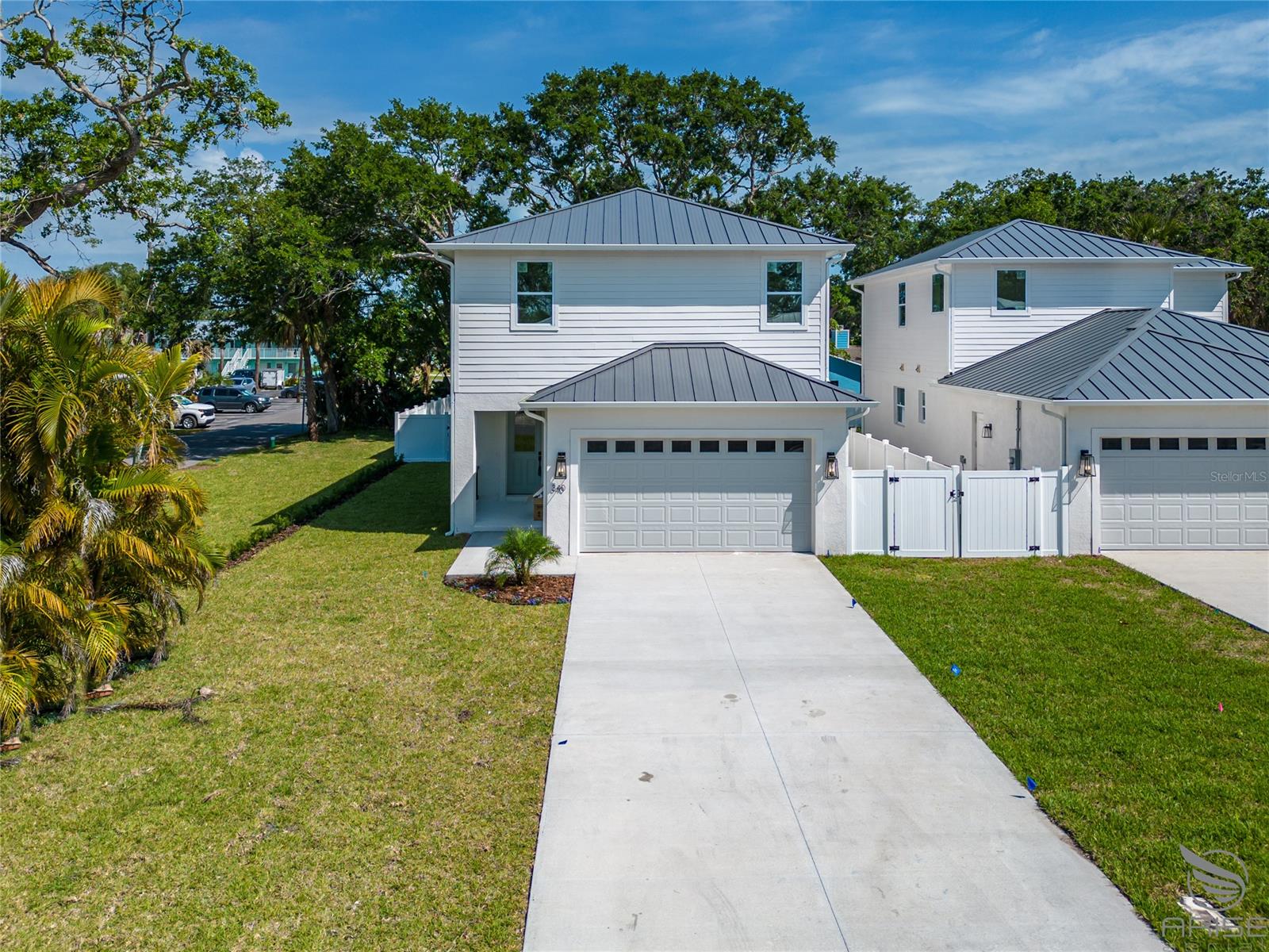 Brand new custom home is now complete and offered at the best price you will find for a newly built home on the beachside! Additionally these homes are located in the highly desirable Central Beach. The builder is offering a $10,000 credit to use toward financing, landscaping, blinds or anything that suits your needs. Golf cart ride or walk to Publix, Flagler Ave, the white sandy New Smyrna Beach or the Intracoastal waterway. A very short walk to two of the best restaurants in town, the Garlic and Norwood's treehouse restaurant! Very quick and easy access to the south causeway on and off the Island. Golf cart or walk to the beach. How about Callalisa Park for some paddle boarding? The builder features and upgrades are very apparent as you enter the foyer. Open floor plan with high 9'4" ceiling height, quartz countertops, stainless steel appliances, natural gas range, tankless natural gas hot-water heater, Impact windows and doors, 8' interior doors, 5 1/4 baseboards, solid wood Shaker cabinets, soft close drawers, room for a pool, oversized 2 car garage and 30 amp RV outlet to house all your beach toys and golf cart, dining room, covered back patio, and upstairs loft perfect for home office space. Standing seam metal roof, rain gutters, large spacious driveway, fully fenced yard with white vinyl, irrigation system, lifetime vinyl flooring throughout, high end designer tile in the bathrooms, and a deep 130' lot. Enjoy the comfort and peace of mind only a newly built home can offer. Think of the savings on insurance current building codes afford. Schedule a viewing today! ;Water: City