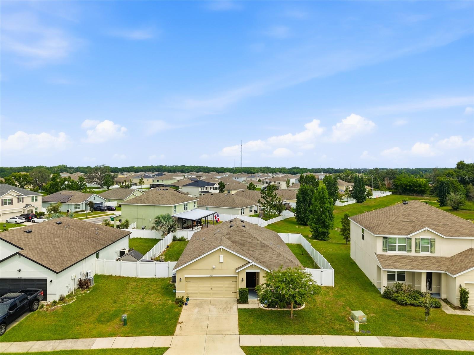 Welcome home to this beautifully maintained 3-bedroom, 2-bath home in the desirable Zephyr Ridge community! Built in 2019, this move-in-ready home offers nearly 1,700
square feet of thoughtfully designed living space with an open-concept floor plan, soaring ceilings, and a desirable split-bedroom layout. Ceramic tile flooring throughout
means there’s no carpet to maintain. The spacious kitchen is the heart of the home, featuring stainless steel appliances, a large pantry, abundant cabinetry, and plenty of
counter space overlooking the living and dining areas perfect for entertaining or everyday living.
The private primary suite includes dual closets, including a walk-in closet, double vanities, and a spacious walk-in shower. Two additional bedrooms and a full bath provide
flexibility for family, guests, or a home office.
Step outside to enjoy the covered lanai overlooking the fully fenced backyard with ample room for pets, play, or gardening.
Additional features include an inside laundry room, 2-car garage, irrigation system, and low HOA fees. Residents enjoy access to the community pool and sidewalks
throughout the neighborhood.
Conveniently located near SR 56, I-75, shopping, dining, Wiregrass Mall, Tampa Premium Outlets, and the exciting growth of Avalon Park, this home offers the perfect
combination of comfort, convenience, and value. Schedule your private showing today!