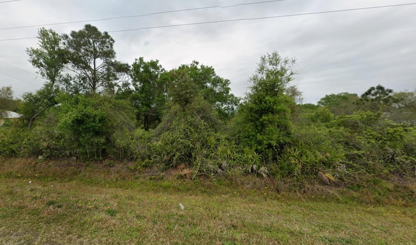 Spacious 0.42-acre Corner Lot in the established Orange Blossom Ranches community of Okeechobee. This larger parcel offers plenty of room for a future single-family residence and outdoor living space, with existing homes nearby and convenient access to US-441, local shopping, schools, dining, and downtown Okeechobee. Enjoy a quiet residential setting while remaining within driving distance of Lake Okeechobee and area recreation. Buyer to verify zoning, permitted uses, mobile or manufactured home eligibility, utilities, access, flood zone, setbacks, and building requirements with Okeechobee County.