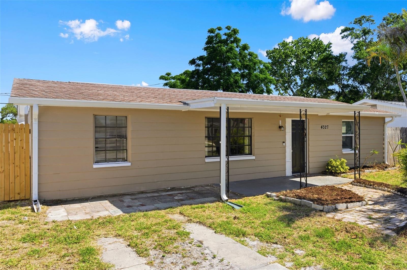 Welcome home! This charming Holiday gem is the perfect opportunity for first-time buyers.  This Beacon home offers an open-concept layout perfect for everyday living and entertaining. Featuring 3 bedrooms, 1 bathroom, and over 1,100 square feet of living space, this home has been thoughtfully updated with a newer roof (July 2020), AC (2020), and water heater (August 2020) — all major mechanicals done! Septic pumped February 2026. New flooring in the living room (2025). Updated electrical panel (1995, permit #222740). The fully updated bath includes a new window (2025).  Step inside to find fresh paint inside and out. The remodeled eat-in kitchen shines with custom cabinets, countertops, backsplash, and a full appliance package. The fully fenced backyard offers privacy, and plenty of room for your pets plus you can relax, garden, or entertain. No HOA! NO FLOOD!  Conveniently located near shopping, dining, Gulf beaches, parks, and major roadways. A great opportunity for a primary residence, seasonal home, or investment property — and a perfect fit for first-time buyers. Don't wait, this one won't last!