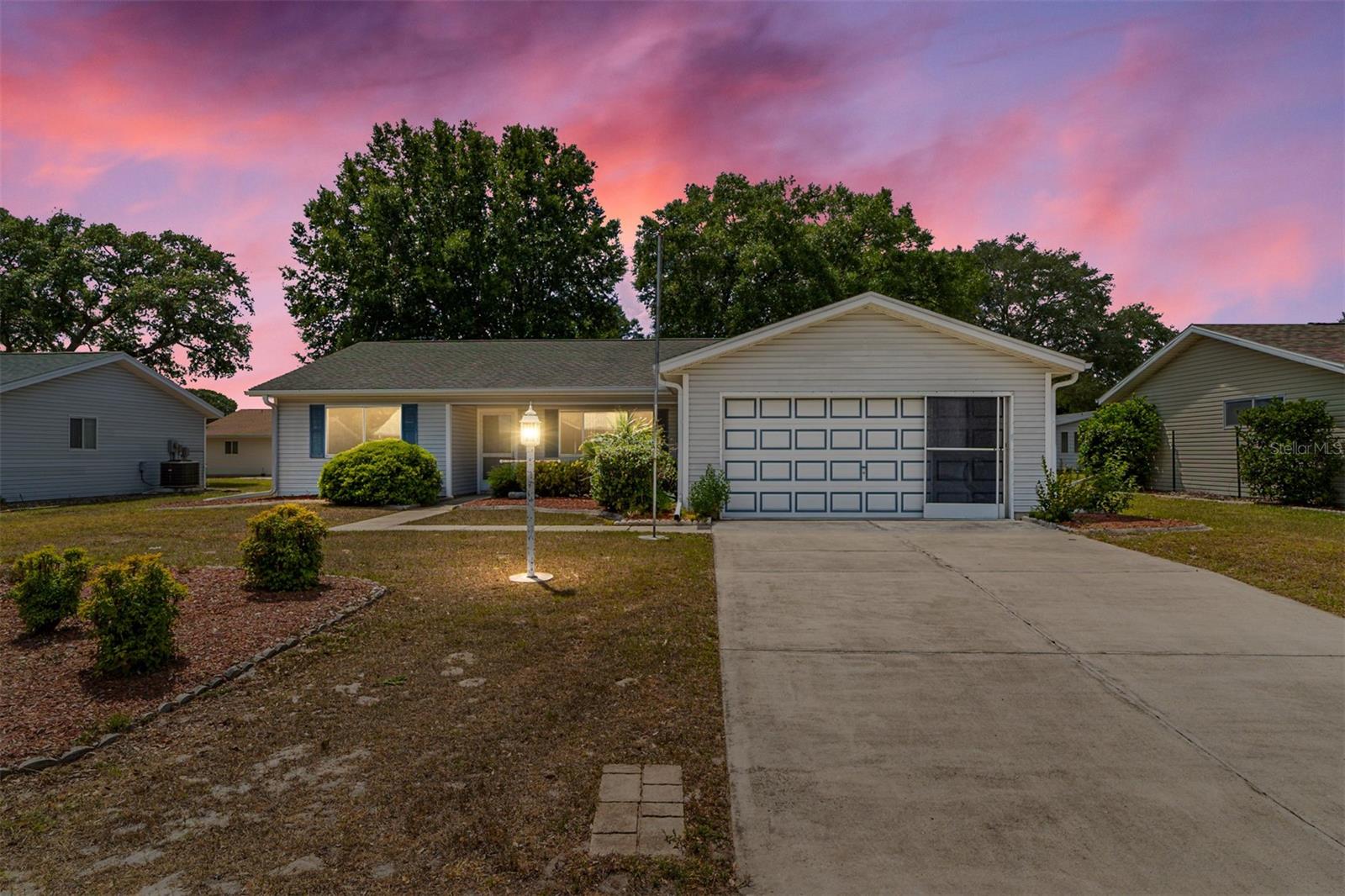 BACK ON THE MARKET DUE TO FINANCE. SELLER IS IN THE PROCESS OF REPLACING THE ROOF & ELECTRICAL PANEL. This quaint 2/2 Hibiscus Model Home with a Large Den is located in the 55+ Community, Marion Landing. Step inside to a large living room that leads out to the enclosed Lanai. It features a Large Kitchen with a two-tier bar & eat-in dining area. Easy access to the garage from the Kitchen. The master bedroom features sliding glass doors out to the lanai, large walk-in closet with a private shower, linen closet & toilet area. The 2nd bedroom is just off the living room with a guest bathroom & linen closet. The large Den can be used as an additional bedroom, study, or office. The lanai is enclosed & features great surrounding windows for you to enjoy your morning coffee or evening tea. Just off the lanai is a patio great for a grilling out. The garage is very spacious with lots of storage & features a screened door. HOA fees are $435.00 Quarterly and includes water, sewer, trash & use the Facility. Marion Landing's Amenities include Bocce Courts, Library, Shuffleboard, Swimming Pool & Spa, Tennis & Pickleball Courts as well as their own Bowling Center. This home is minutes from Restaurants & Shopping.