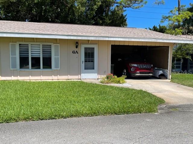 Come take a good look at this lovely Condo in Country Club Chalets. a 55 & Up Community. Centrally located in the heart of NSB just off of Wayne Avenue and across the street from the NSB Golf Course this home is close to everywhere you need to be without feeling the business of being downtown. This unit features many upgrades including a new Roof, new A/C system, new vinyl flooring throughout the main living areas, new hot water heater and upgraded Stainless steel refrigerator. The dishwasher and washer and dryer are also newer. The owner has replaced the windows  and added a lovely side screened in porch for entertaining. The carport is also screened in with blinds for shade as well as an electric screen on a remote as well. This could easily be converted to additional living as many other units have done. The front storm door is also new. This owner put a lot of love into this unit. Country Club Chalets amenities include a lovely Community Clubhouse and a heated pool! Don't Miss your chance to see it before it is gone! ;Water: City