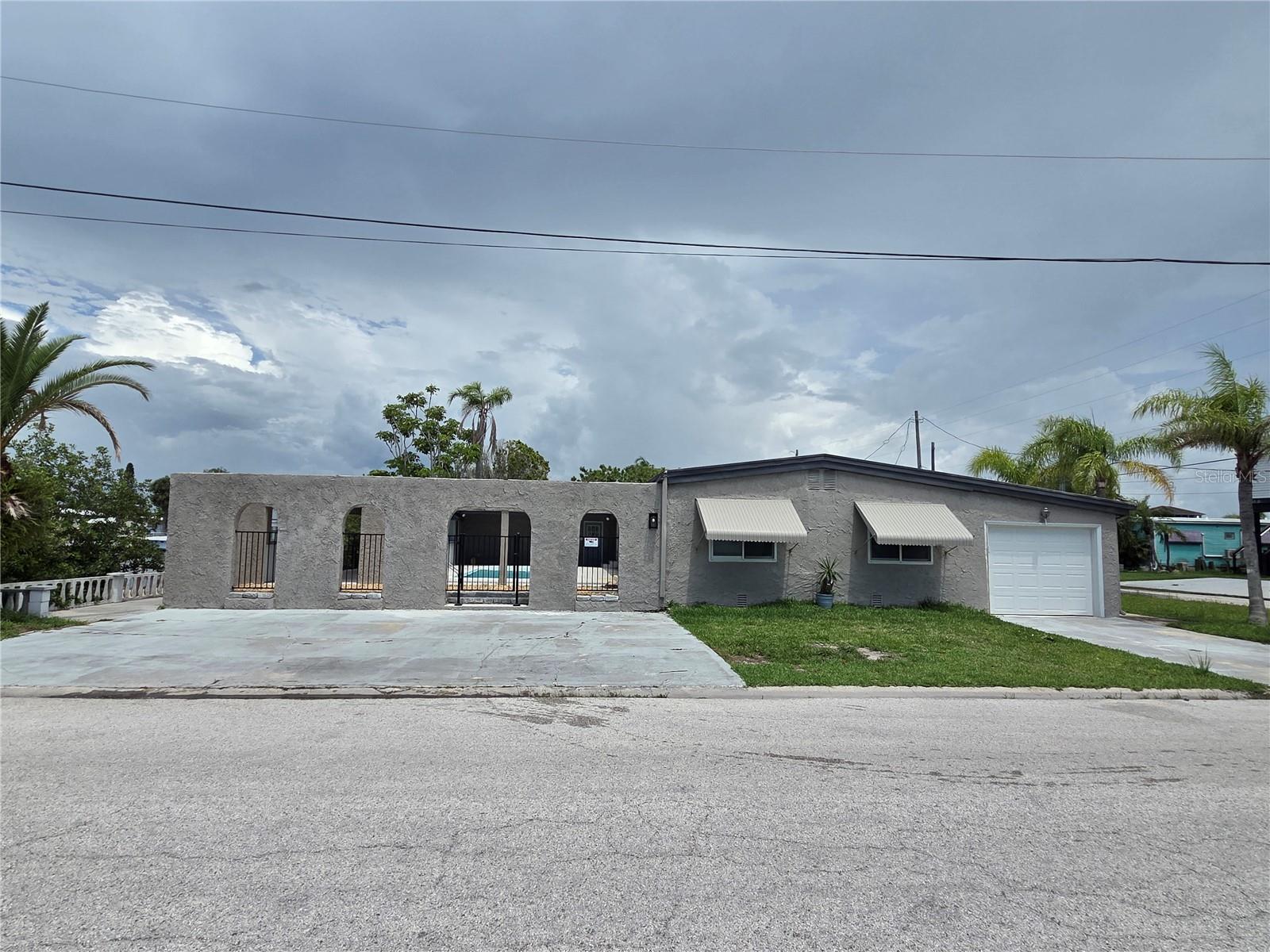 BOATER'S DREAM! Situated on a deep-water canal in the desirable Signal Cove community, this waterfront property is just minutes from the Gulf of Mexico and offers exceptional boating access. Features include an in-ground pool, poolside cabana, floating dock, seawall, spacious courtyard, and a detached block-constructed garage/cabana building.

The seller has invested approximately $100,000 in renovations, providing an excellent opportunity for the next owner to add their personal finishing touches and create their ideal waterfront retreat. This property also presents strong investment potential, having previously generated $2,800/month in rental income.

The home experienced water intrusion during Hurricane Helene and has been repaired with permits by a licensed contractor.

Signal Cove offers the freedom of no mandatory HOA and no CDD fees. Residents may choose to join the community association to enjoy access to the private boat ramp and clubhouse activities. Best of all, you own the land.

Property is being sold AS-IS. Cash buyers only.