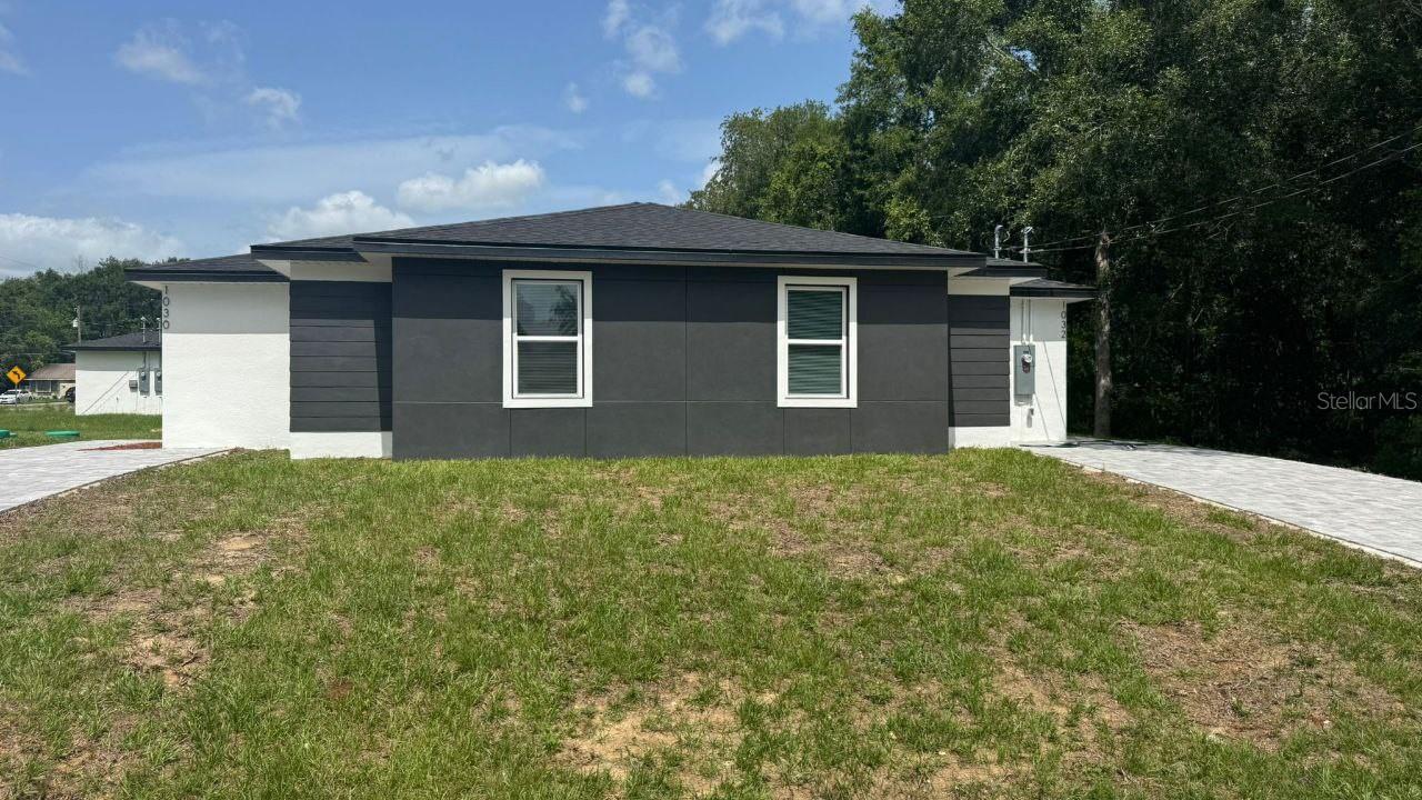 AMAZING DUPLEX...3 Bedrooms and 2 Bathrooms for unit! This property features an open floor plan with luxury vinyl plank flooring throughout. The gourmet kitchen features stainless steel appliances including granite countertops, kitchen cabinets, a fully tiled shower and tub surrounds.