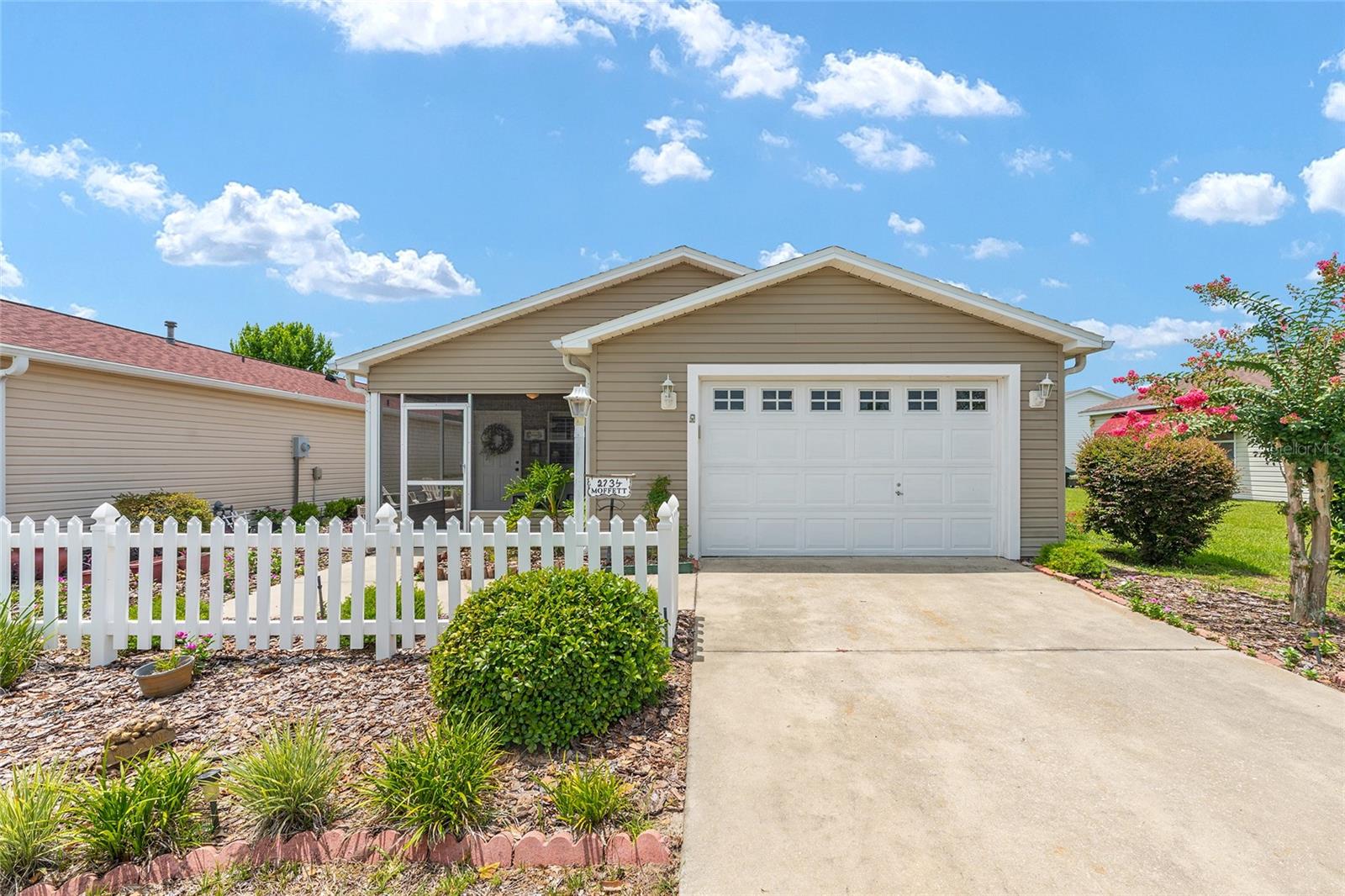 BOND IS PAID!! Village of Alhambra, Villa Del Canto! Colony Patio Villa – END UNIT – Comes TURN KEY!! This ADORABLE 2/2 villa features a 2019 ROOF, 2023 HVAC, PLANTATION SHUTTERS throughout, CUSTOM Painted Murals, Gutters and Downspouts, a Front Screened Lanai, Side Patio, and Mature Landscaping! Inside, you’ll find VAULTED CEILINGS, an OPEN Floorplan, Laminate and Tile Flooring in the Main Living Areas, and Carpet in the Bedrooms. The Kitchen offers a SOLAR TUBE, Pantry Closet, and BREAKFAST BAR OVERHANG with Tile Front. The Living Room is Welcoming and Bright with a Ceiling Fan and Light, and the Dining Space features the Front Window to the Lania plus Glass Slider Doors to the Side Patio with Plantation Shutters. The Hall to the Bedrooms includes a LINEN CLOSET, Overhead Light, and Thermostat. The PRIMARY BEDROOM is Spacious with Vaulted Ceilings, a Large WALK IN Closet, and an En Suite Bathroom with Step in Shower with Two Corner Bench Seats, LINEN CLOSET, Single Vanity, Medicine Cabinet, and Commode. The Guest Bedroom has a High & Vaulted Ceiling, Closet with Sliding Doors, Window to the Backyard, and the Couch is a Sofa Sleeper. The Guest Bathroom includes an All in One Tub/Shower Combo, Exhaust Fan, Single Vanity, and Commode. The Garage is a One Car plus Golf Cart Garage with Garage Door Windows, Keyless Entry, Attic Access Panel, and Irrigation System. GREAT LOCATION! Savannah Sports Pool & Regional Rec Center: 1 mile; El Santiago Pool & Rec Center & Executive Golf Course, Tennis & Pickleball Courts: 1.4 miles; El Diablo Executive Golf Course: 1.2 miles; Glenview Championship Golf Course & Country Club: 1.5 miles; Springdale Pool & Dog Park: 2 miles; Hacienda Hills Championship Golf Course: 2.7 miles; Tierra Del Sol Recreation Center: 2.8 miles; De La Vista Executive Golf Course: 2.9 miles; Spanish Springs Town Square®: 3.5 miles; Lake Sumter Landing Market Square®: 5.7 miles. BOND IS PAID. Villa Del Canto Maintenance: $216.89/year. Sumter Fire Assessment: $320.71/year. The Villages Amenity Fee: $204/month. Home comes TURN KEY (Golf Cart not Included)!! DON’T MISS OUT ON THIS GEM!