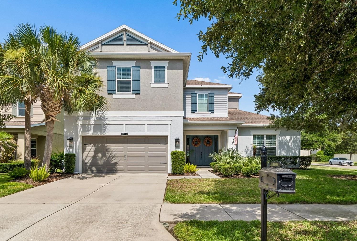 Welcome to this magazine-worthy residence in the highly sought-after gated enclave of Gardenia Glen within the award-winning Connerton community, where resort-style living and everyday comfort come together seamlessly. As an added benefit, landscape and lawn maintenance are included through the HOA, allowing for a truly low-maintenance lifestyle.

Built by Taylor Morrison, this exceptional Kentwood III floor plan offers 3,450 square feet of thoughtfully designed living space, featuring five bedrooms, four-and-a-half bathrooms, and a versatile layout that effortlessly accommodates both entertaining and daily living. A private first-floor guest suite with its own en-suite bath provides the perfect retreat for visitors, extended family, or multigenerational living.

At the heart of the home, the gourmet kitchen is designed to impress. An oversized granite island with seating for up to five serves as a natural gathering space, complemented by abundant cabinetry, generous counter space, and a spacious breakfast area ideal for casual dining and morning coffee.

The open-concept design flows effortlessly into the expansive great room, where soaring ceilings, elegant coffered details, custom trim work, and designer wall accents create an atmosphere of timeless elegance and comfort. Large windows fill the home with natural light, enhancing the bright, airy feel and creating a seamless connection to the outdoor living spaces.

Step outside to your own private backyard oasis, thoughtfully designed for year-round enjoyment. The covered lanai features a motorized retractable screen that can be adjusted to your preferred height at the touch of a button, providing the perfect balance of shade, privacy, and open-air living. Just steps away, the sparkling heated saltwater pool offers an idyllic setting for relaxing afternoons, entertaining guests, or soaking up Florida's sunshine in style.

Upstairs, a spacious bonus room offers endless possibilities. Complete with a projector and screen, this flexible space can easily serve as a home theater, media room, game room, fitness studio, home office, or playroom—tailored to fit your lifestyle.

Situated on a desirable larger corner lot within the gated Gardenia Glen neighborhood, this move-in-ready home offers a rare combination of privacy, elegance, and peace of mind, while still providing opportunities to add your own personal touches.

Beyond the home, Connerton delivers an exceptional lifestyle experience. Residents enjoy access to multiple clubhouses, resort-style pools, beautifully maintained parks and gardens, scenic walking and biking trails, and picturesque ponds designed for non-motorized recreation. Whether you prefer an active lifestyle, outdoor adventure, or simply relaxing in a beautiful setting, Connerton offers something for everyone.

Experience the perfect blend of luxury, comfort, and convenience in one of the area's most desirable communities. This extraordinary home is ready to welcome its next owner. Schedule your showing today.