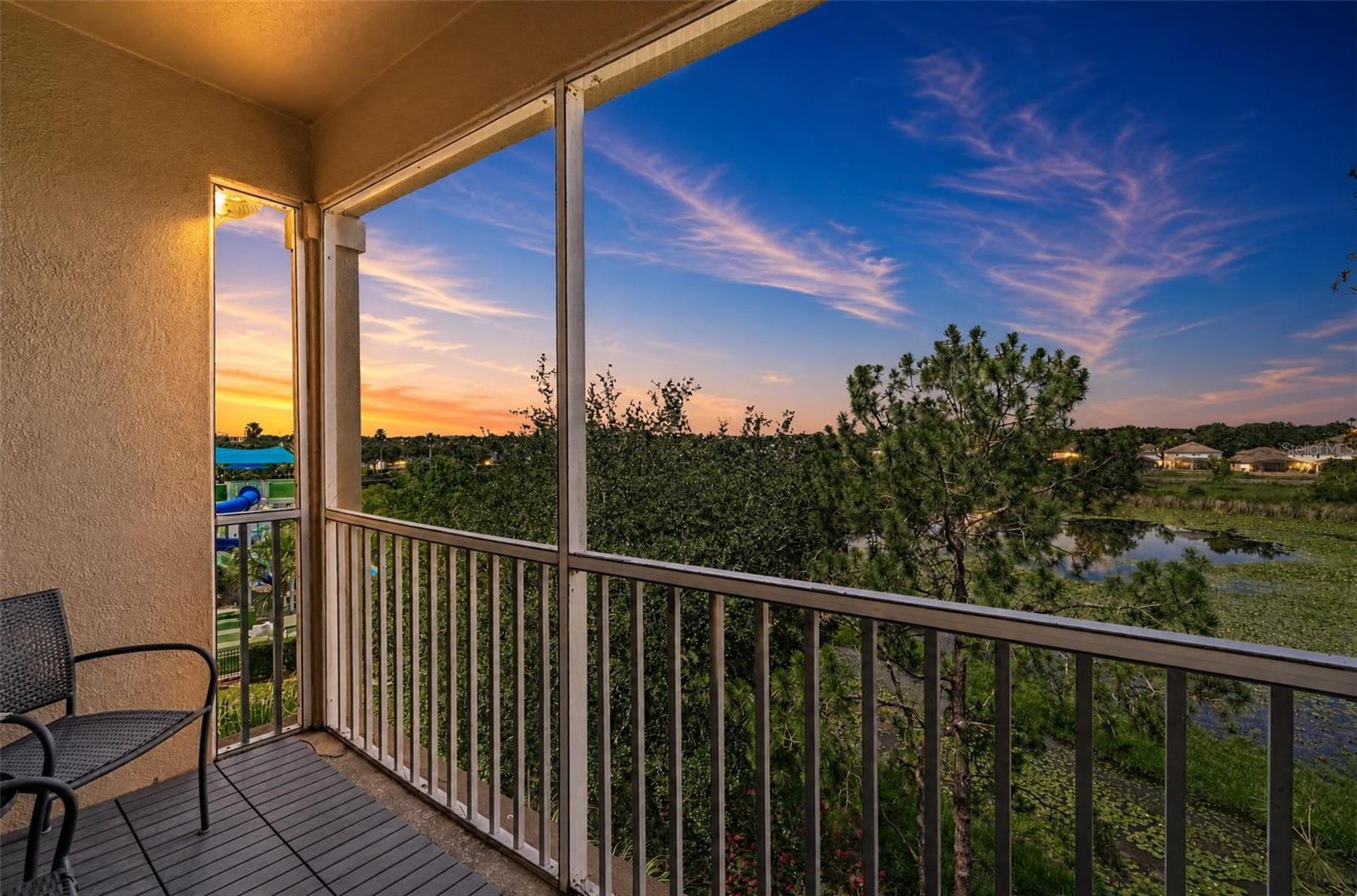 There’s only one penthouse corner condo like this in all of Windsor Hills—and it’s up for grabs. Imagine waking up every morning to a private, panoramic view of the splash pad and lake, high above it all on the top floor. This is the crown jewel of Windsor Hills—fully renovated from top to bottom with quartz countertops, luxury vinyl plank flooring, fresh paint, new furnishings, and high-end everything, from mattresses to bedding. It’s not just a home; it’s a proven short-term rental powerhouse, booking between $36,427 and over $43,000 a year!

Step inside and feel your jaw drop. The bright, open layout flows straight into a kitchen ready for anything—quick breakfasts or big family dinners. The living room is pure comfort, with a plush sectional and a 55” HD TV perfect for movie nights after a day at the parks. But what really sets this condo apart is the balcony. It’s huge. Start your mornings with coffee, listening to the waterfalls from the water park below and soaking in that unbeatable lake view. Then, as the sun slips down, let the golden hour light set the mood for a perfect evening.

Every bedroom is an experience. The oversized master suite is a retreat all its own, with a king bed topped with luxe linens, a spa-inspired shower, and those same incredible lake views right from your window. The Star Wars room? Kids (and kids at heart) will lose their minds—think twin-over-full bunk, cool bean bag corner, and a teepee tent for secret hideouts. Whether you’re with the Resistance or the First Order, this is your launch pad for adventure. And the Princess suite is pure pampering: a dreamy queen bed, soft velvet pillows, crisp sheets—ideal for drifting off after a day of fun.

With 1,246 square feet and a split floor plan for privacy, this condo is turnkey—ready to be your stunning primary home, an unforgettable vacation base, or a high-earning rental. Updates are everywhere with this renovated condo, some dates include: Brand-new LG washer and dryer (June 2026), water heater (2021), HVAC (2020), stainless steel appliances and garbage disposal (2019), Logitech video doorbell, Schlage smart lock, Ecobee smart thermostat, new smoke detectors and so much more.

This isn’t just a condo—it’s your chance to own the best unit in Windsor Hills, where every day feels like you’re on vacation. Windsor Hills is one of Orlando’s most in-demand gated communities, just two miles from Disney and minutes to Universal, SeaWorld, world-class shopping, and endless dining. The resort’s amenities are next-level: a massive heated pool with water slides, splash zone, hot tub, movie theater, fitness center, putting green, playgrounds, and 24/7 security. Every day here feels like a getaway.

What truly makes this special is the location. You’re a quick hop to the magic of Disney, Universal, SeaWorld, and everything else Orlando has to offer. The community is loaded with attractions: a giant water park, three-story slides, interactive splash zone, zero-entry pool, fitness center, arcade, movie theater, tennis courts, and round-the-clock gated security.

Opportunities like this rarely come along. If you want your own slice of paradise in one of Orlando’s top resort communities, don’t wait. Schedule your showing today and start living the Florida dream!

All measurements, room sizes, and HOA information should be verified by the buyer or their agent.