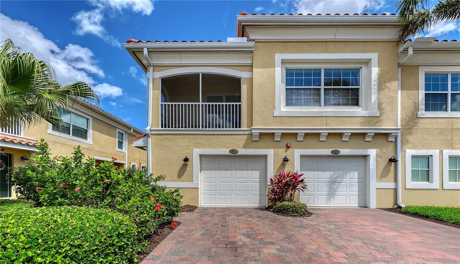 Coastal convenience meets effortless living, just minutes from Siesta Key, America’s #1 beach. Welcome to 4226 Frontier Lane, a beautifully maintained 2-bedroom, 2-bath walk-up condo in the gated community of Bay Street Village, offering exceptional value and an easy Florida lifestyle. Built for peace of mind with hurricane impact windows concrete-block construction. A private ground-level garage provides added convenience and storage. Upstairs, the bright, open-concept floor plan is filled with natural light, creating an inviting space for both everyday living and entertaining. The well-appointed kitchen features 42" cabinetry, granite countertops, stainless steel appliances, and a spacious walk-in pantry, seamlessly flowing into the dining and living areas. Step out onto your large, screened-in lanai to enjoy peaceful mornings or evening cocktails.

The generously sized primary suite offers a walk-in closet and an ensuite bath with dual vanities and a tiled walk-in shower. A second bedroom and full bath provide flexibility for guests, a home office, or additional living space.

Ideally located in Osprey, between Sarasota and Venice, you’ll enjoy a quiet, tucked-away setting with shopping, dining, and daily conveniences just minutes away. Bay Street Village residents enjoy resort-style amenities including a heated pool, fitness center, and clubhouse. With reasonable HOA fees covering exterior maintenance, roof, water, sewer, and gated access (and no flood insurance required) this is truly low-maintenance ownership at its best.

Perfect as a full-time residence, seasonal escape, or investment opportunity this is Florida living, simplified.