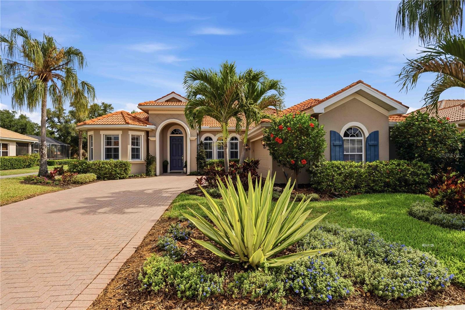 Located inside the gates of Venetian Golf & River Club, this rarely available extended Correggio floor plan offers the perfect blend of luxury, comfort, and effortless Florida living. Featuring 3 bedrooms, 2 bathrooms, a den, with a private POOL/SPA, this spacious Furnished residence is thoughtfully designed with IMPACT WINDOWS for both everyday living, peace of mind,  and entertaining. Perfectly positioned to capture peaceful golf course views (hole #2) and natural light, the highly sought-after extended layout showcases expansive living spaces, soaring ceilings, crown molding, and Brazilian Cherry engineered hardwood flooring throughout the main living areas. Oversized sliding glass doors create seamless indoor-outdoor living, opening to the screened lanai complete with a STORM SMART electric hurricane roll-down shutter for added protection and peace of mind. The gourmet kitchen is designed to impress with stone countertops, stainless steel appliances, abundant cabinetry, and an oversized island overlooking the great room and dining area. The spacious primary suite offers a relaxing retreat with dual walk-in closets and a spa-inspired bath, and a door to your lanai. This split floor plan with guest bedrooms thoughtfully positioned for privacy and comfort. Additional highlights include designer finishes, abundant storage space in both the laundry room and garage with built-in cabinetry, and a desirable side-load two-and-a-half-car garage with room for a golf cart or additional storage. Enjoy resort-style living with access to the River Club, resort-style pool with tiki bar, lap pool, fitness center, tennis, pickleball, scenic walking trails along the Myakka River, fine dining, and a vibrant social calendar, with optional championship golf available at the Venetian Golf Club. Ideally located just minutes from Gulf beaches, downtown Venice, Sarasota Memorial Hospital, shopping, dining, and I-75.