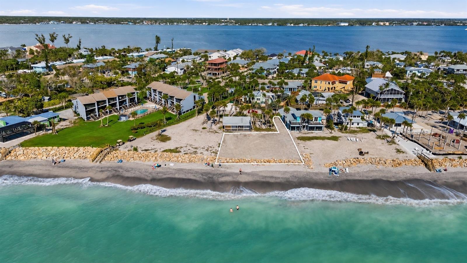 4706 North Beach Road, Manasota Key, Englewood, FL 34223
Gulf Front Home Site Manasota Key Build Your Legacy on 85± Feet of Gulf Shoreline
Rarely does an opportunity of this magnitude present itself a true Gulf front home site on Manasota Key with approximately 85 linear feet of direct Gulf of Mexico frontage. This is not a view lot. This is not deeded beach access. This is your own private stretch of white sand on one of Florida’s most coveted and protected barrier islands.
Situated on North Beach Road, the most sought after address on Manasota Key, this parcel is the ideal foundation for a custom designed legacy estate: a place where your family will return year after year, where memories are made across generations, and where the value of the land quietly appreciates beneath your feet just as it has for every wise investor who planted their flag on this island before you.
Manasota Key is a barrier island off the Gulf Coast of Florida offering privacy and pristine beauty, primarily residential in character with a wildlife sanctuary — a place to build or purchase the tropical home of your dreams. With a year round population of fewer than 1,500, this is not a place you stumble upon. You arrive here intentionally and you stay.
The site is survey ready with a 2024 boundary and elevation survey completed by Florida Engineering & Surveying, LLC, placing the property in Flood Zone VE (elevation 14), confirming authentic, primary beachfront status. Palm trees grace the property today. Your architect’s vision fills it tomorrow.
Whether you are a 1031 exchange investor seeking a hard asset with irreplaceable scarcity, a family looking to anchor a trust with a multigenerational Gulf front retreat, or a luxury builder ready to bring a signature coastal estate to life, this is the site that checks every box. Beachfront land on Manasota Key does not come back to market. When it’s gone, it’s gone.
The Gulf is calling. Your legacy starts here. to discuss acquisition strategy, 1031 exchange compatibility, and trust held ownership structures.