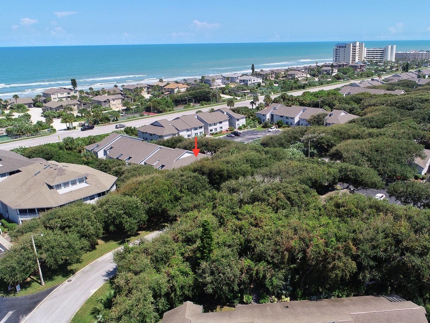 Welcome to the naturally beautiful neighborhood, Sea Woods. Centrally located in New Smyrna Beach, right across from the non-driving portion and walking distance to shopping, dining and entertainment. This condo is located on the short-term rental zoning map for NSB. A three bedroom condo nestled in a quiet area in building 4325, away from S Atlantic traffic. The living area features *NEW PAINT* an open floor plan, fully equipped kitchen with BRAND NEW Fridgidaire stainless appliance package and convenient indoor laundry. Dining room accommodates seating for six or more. Large master bedroom comfortably fits king size bed featuring en suite master bath with single sink, spacious vanity, clothes closet, linen closet and tub/shower. Guest bedroom has a queen bed and en suite access to shared guest bath with tub/shower. Third bedroom is large enough for two twins with hallway to closet and shared bath. Open air balcony patio is pleasantly shaded by oak hammocks and features a storage closet for supplies and beach gear. Additional storage closet available inside the unit. Updates include newer roof on the building (2016), A/C 2012 and tile floors in bathrooms and front entry. Sea Woods community offers clubhouse, fitness center, three pools - one is heated, tennis courts, racquet ball courts, shaded walk/jog/bike path throughout, roving security and boardwalk with crosswalk to the beach. REALTOR measured rooms. All measurements are approx. ;LocationDescription: Condo ;Water: City