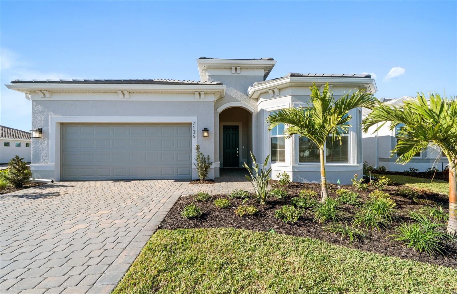 Under Construction. Located in the master-planned community of Sea Flower in southwest Bradenton, FL, this home offers more than just beautiful design—it’s part of a vibrant coastal lifestyle. Centered around a 19-acre lake with parks and trails, Sea Flower features resort-style amenities at The Garden Club, including a pool, fitness center, pickleball courts, and more. Residents will enjoy pocket parks, dog parks, and a future Village Center with a Publix, shops, restaurants, and gathering spaces. Just over 3 miles from Anna Maria Island and close to Longboat Key, St. Armand’s Circle, and LECOM Park, the location blends natural beauty, convenience, and recreation.