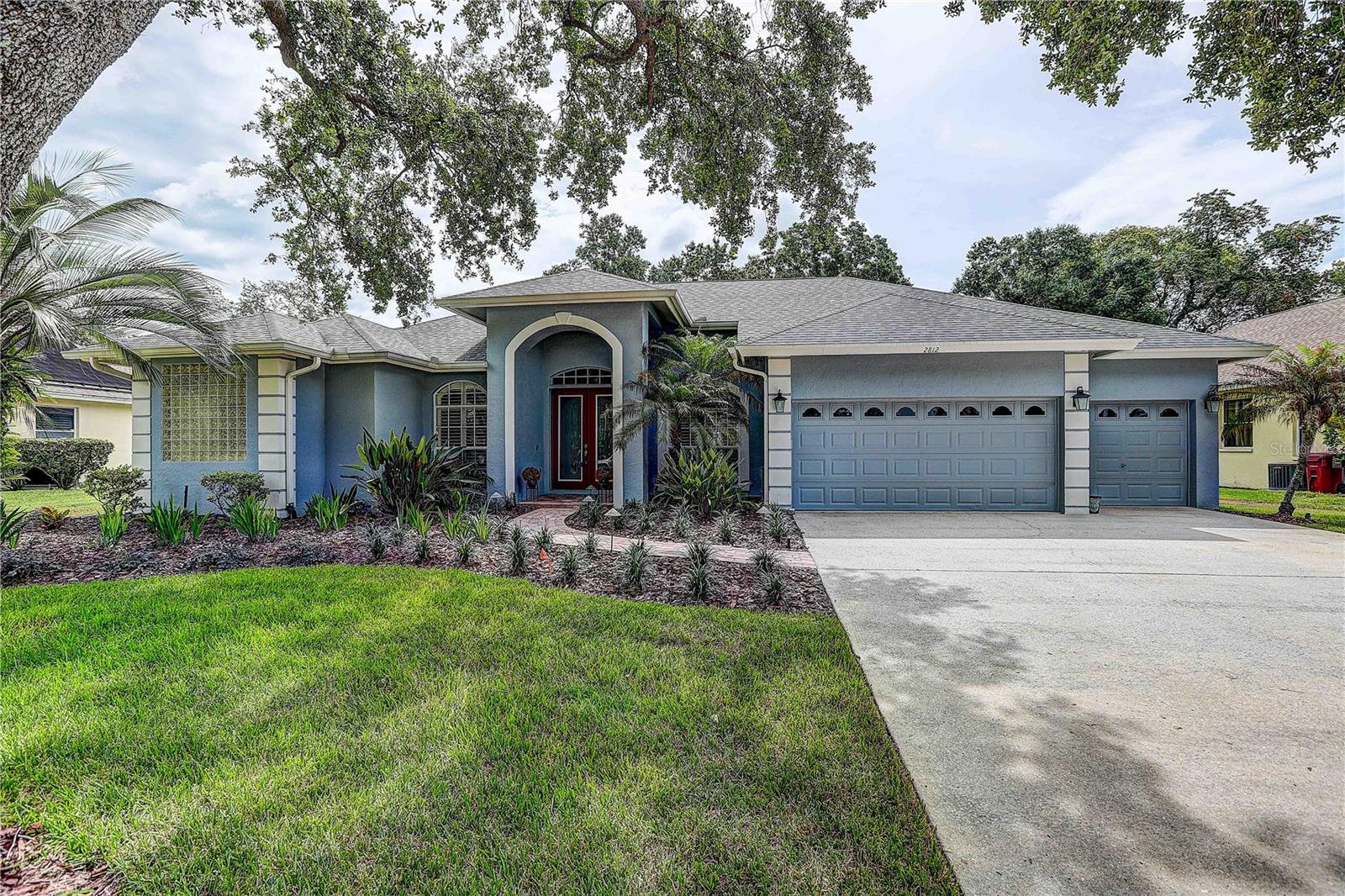Welcome to 2812 Clubhouse Drive, located in the prestigious Aston Woods neighborhood of the sought-after Walden Lake Community. This exceptional 4-bedroom, 3-bathroom with a office home offers 2,768 square feet of completely remodeled living space on a beautifully landscaped quarter-acre lot. From the moment you enter, you'll appreciate the impressive 12-foot ceilings with crown molding in the foyer, living room, and dining room, creating an elegant and spacious atmosphere. The remainder of the home features 10-foot ceilings and upgraded 5-inch baseboards throughout. The thoughtfully redesigned interior showcases hardwood flooring in the primary suite, office, and family room, complemented by modern 20-inch porcelain tile throughout the main living areas and kitchen. The luxurious primary suite includes custom-designed closets with built-in shelving and hampers, while the spa-inspired primary bath features marble finishes, a custom soaking tub, dual vanities, Kohler fixtures, and a large walk-in shower with dual shower heads and a built-in bench. Even the custom cabinetry includes integrated electrical outlets within the pull-out storage drawers. The gourmet kitchen is designed for both everyday living and entertaining, featuring updated hardwood cabinetry, pull-out pantry shelving, Bosch and LG appliances, wine storage, and soft-close cabinetry throughout. The family room was extensively remodeled in 2020 and serves as the centerpiece of the home with a stunning feature wall, built-in surround sound system, Sonos audio system, modern electric fireplace, and custom floating shelves with additional cabinetry. Both secondary bathrooms have been tastefully remodeled with modern finishes and fixtures.
Major updates provide peace of mind, including a new roof in 2020, exterior paint in 2021, a freshly refinished pool in 2025, a newly painted 3-car garage with upgraded floor coating in 2026, and new front landscaping completed in 2026.
This move-in ready luxury home combines timeless elegance, modern upgrades, and one of Walden Lake's most desirable locations. Schedule your private showing today and experience the quality and attention to detail that make this Aston Woods residence truly exceptional.