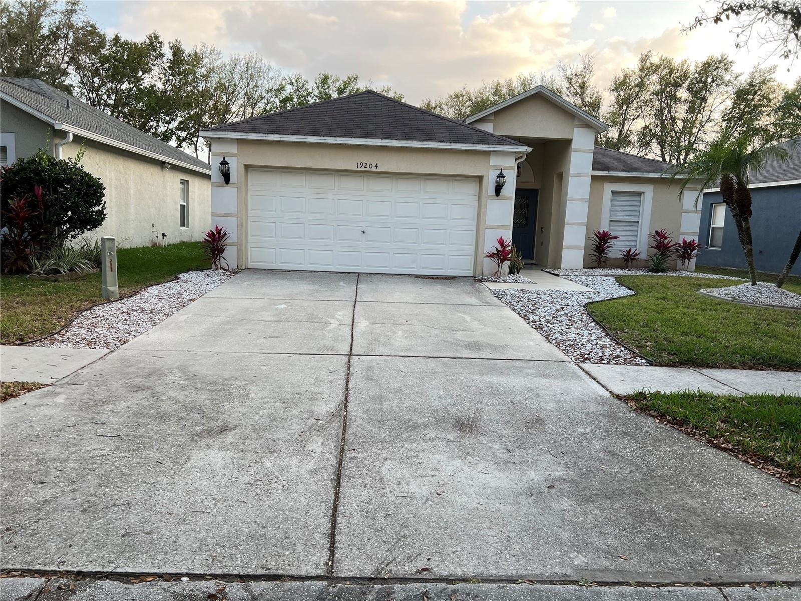 Location Location Location! Come take a look at this BEAUTIFULLY remodeled home in the West Meadows section of Tampa Palms! Step in through the double door entry and prepare to be amazed! Light and Bright and ultra modern! From the Gorgeous Tile throughout, to the Accent wall in the Dining Room, to the Unique Glass Bowl sinks in the bathrooms, no detail was spared. Lawn care and Security system included in the rent amount, as well as access to the amenities available to the community.