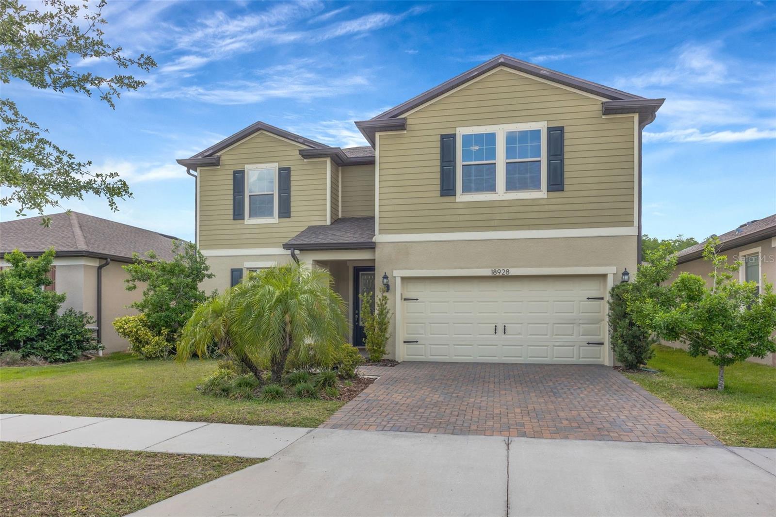 Welcome to this beautifully maintained 5-bedroom, 3-bathroom home offering nearly 2,900 square feet of thoughtfully designed living space in a private gated community in the heart of Lutz. Built in 2019, this move-in-ready home combines modern finishes, a functional layout, and an unbeatable location.
Designed with flexibility in mind, the home features a first-floor primary suite along with one secondary bedroom and a full bathroom on the main level, making it ideal for guests, multigenerational living, or a home office. The spacious open-concept living area flows seamlessly into the gourmet kitchen, complete with quartz countertops, ample cabinetry, and generous workspace for cooking and entertaining. Quartz countertops continue throughout all bathrooms, creating a cohesive, upscale feel.
Upstairs, you'll find a large loft that offers endless possibilities as a media room, playroom, or second living area. Three additional bedrooms share a spacious bathroom featuring dual sinks, providing plenty of room for family and guests.
Step outside to enjoy the large covered and screened lanai, perfect for relaxing or entertaining year-round, overlooking a fully fenced backyard with plenty of space for pets, play, or future outdoor enhancements.
Located in a desirable gated community and zoned for A+ rated schools, this exceptional home is just minutes from shopping, dining, parks, and major highways, offering easy access to everything the Tampa Bay area has to offer.
Don't miss your opportunity to own this exceptional Lutz home—schedule your private showing today!