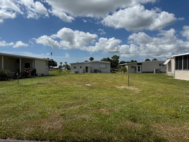 Vacant lot in a vibrant 55+ community!  La Casa offers the ultimate Florida lifestyle.  We have 974 homes nestled among a variety of native trees with spacious common grounds surrounding our eight lakes.  Located between Sarasota and Fort Myers, this is a boater's dream with access to the Gulf of Mexico. It is convenient for shopping, sightseeing, golfing, fishing, and boating, as well as all the culture and elegance the Southwest Florida area is noted for. La Casa may have the best pools in the area. Our crown jewel is an extremely large, 40 X 60-foot swimming pool that is kept at a perfect 87 degrees. Our smaller 20 x 40 pool is quietly nestled between the clubhouse and the Activity Building. Both pools have adjacent hot tubs which are ideal for soaking muscles that are tired from golfing or tennis. Wireless Internet (Wi-Fi) is available at the Clubhouse, Activity Building, and Recreation Hall area where these pools & spas are located, so you can catch some rays while you catch up on your email! Sound enticing? Come for a visit to this self-contained oasis and see for yourself why La Casa is the ultimate destination for both snowbirds and year-round residents!