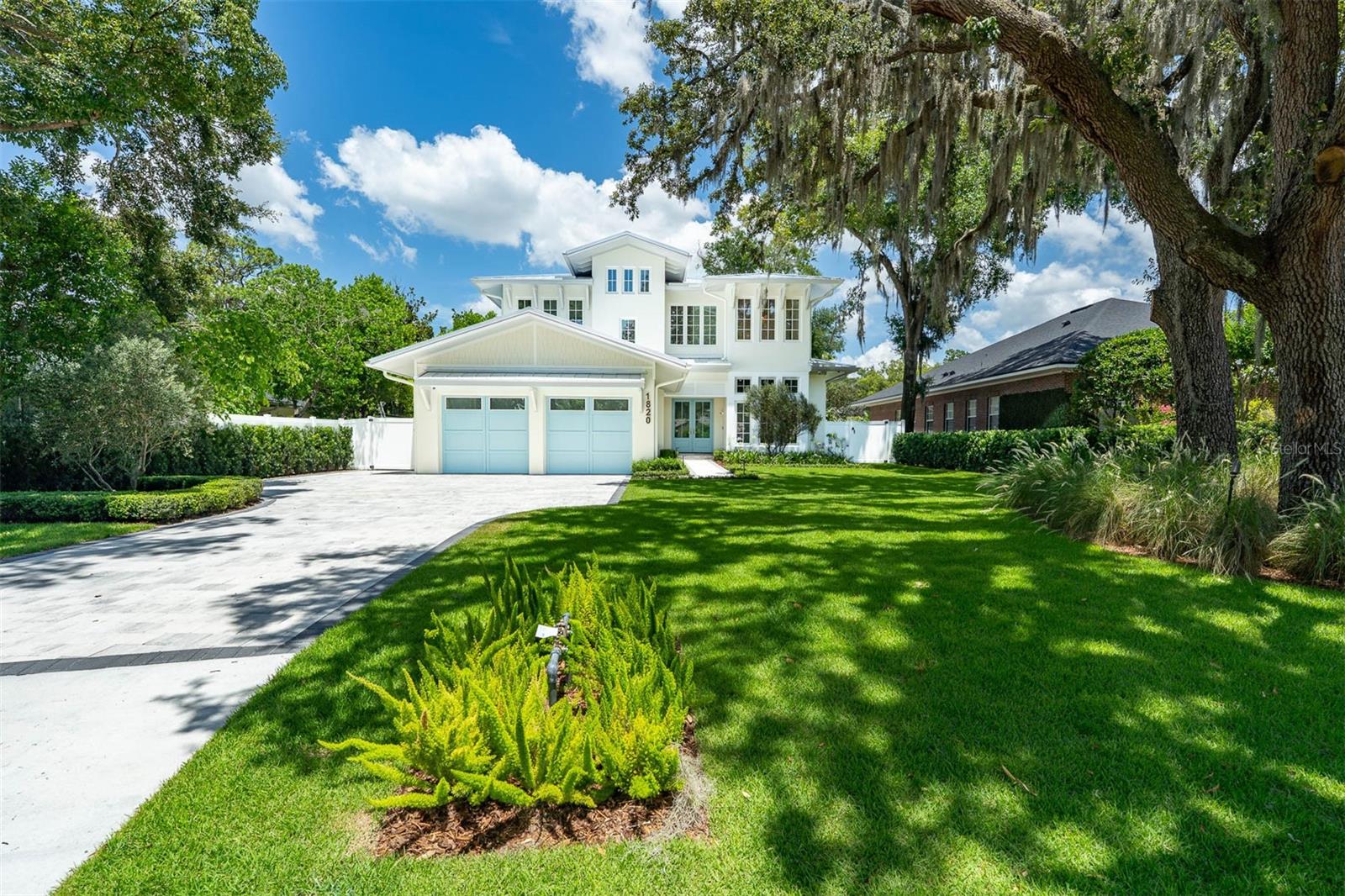Discover premier Winter Park luxury real estate at 1820 Glencoe Road—a stunning Dutch West Indies–inspired custom home built by FG Schaub Custom Homes. Ideally located minutes from Park Avenue, Rollins College, and downtown Winter Park, this residence offers the perfect blend of coastal architecture and modern Florida luxury living.

With 4,055 sqft. of thoughtfully designed space, this Winter Park pool home features 5 bedrooms, 5 full bathrooms, 2 half baths, and a private home office. A grand entryway opens to a bright, open-concept interior with expansive Andersen windows that enhance indoor-outdoor flow—an essential feature for Florida homes.

The chef’s kitchen is a standout, equipped with Wolf and Sub-Zero appliances, custom cabinetry, quartz countertops, and an oversized island ideal for entertaining. The great room offers seamless living with a wet bar, wine column, and elegant tiled electric fireplace.

The first-floor primary suite serves as a private retreat with a spa-style bathroom that includes dual vanities, a soaking tub, glass-enclosed walk-in shower, towel warmer, and custom walk-in closet. A guest suite with a walk-in closet and en-suite bathroom, dining area, and main laundry room complete the first level.

Upstairs, you’ll find a dedicated office, activity room, powder bath, secondary stackable laundry, and 3 spacious ensuite bedrooms—each with generous walk-in closets and ceiling fans.

Designed for year-round indoor-outdoor living, the transitional room features a full summer kitchen with grill, hood vent, refrigerator, retractable screen, mini-split A/C, and an additional powder bath. Step into your private backyard oasis with a resort-style pool, spa, fire pit, outdoor shower, Travertine pool deck, and lush tropical landscaping—perfect for relaxing or entertaining.

Additional features include security cameras, surround sound, an oversized 2-car garage with EV charging port, epoxy floors, LED lighting, a paver driveway with extra parking, standing seam metal roof, privacy fencing, and professional landscaping. Located in one of Winter Park’s most desirable neighborhoods and zoned for Audubon K-8 / Winter Park High School. Schedule your private tour today.

**Builder is offering up to $30,000 in buyer incentives toward window treatments with an acceptable offer.**