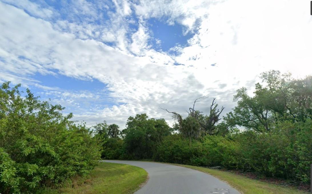 This large corner lot in North West Port Charlotte provides the perfect canvas for your Florida lifestyle! With over half an acre of space, you can build a custom home with room for a pool, gardens, or outdoor entertaining. Conveniently situated near shopping, dining, golf, and the Gulf Coast beaches, this property combines privacy, flexibility, and the best of Southwest Florida living.