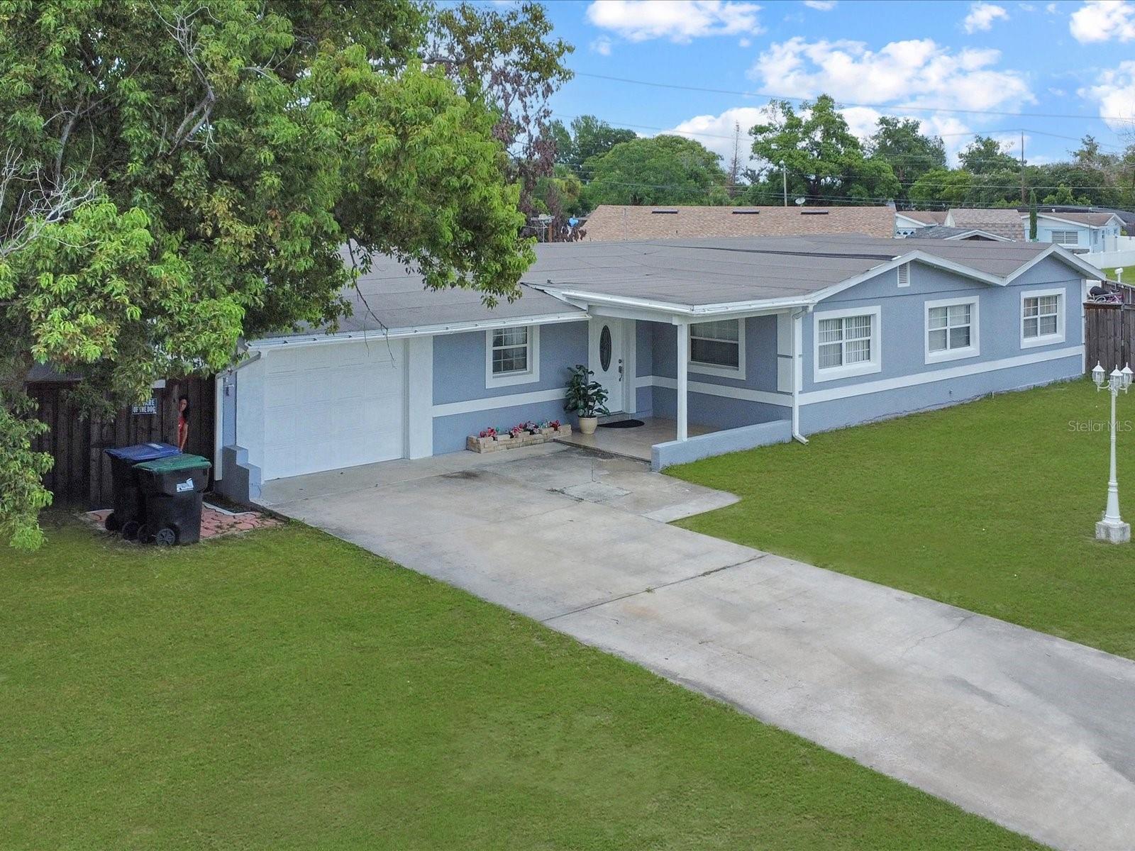 HUGE Corner Lot!! Location, Location, Location!! Excellent value as one of the few Corner lots, Fenced property on over  1/4 Acre at a great price. Home is in excellent condition and hosts a very large Family/Movie Room with excellent views to the very HUGE and spacious back and side yards, great to host your family BBQ's. The dinning area and living room are equally comfortable and spacious. The Master bedroom is homely and moderate in space. One feature that puts this home above and beyond is the Mother Daughter with Private entrance, Kitchen and Walk in Shower.. There's more, this property is walking distance form many shopping attractions on OBT and just minutes form the beautiful Florida Mall, Less tham 10 Minutes from MCO Orlando Internationl Airport, just a short drive to the outlets for big savings when shopping. A must see. Please include Pre-Qaul letter and/or Proof of funds with any offers.