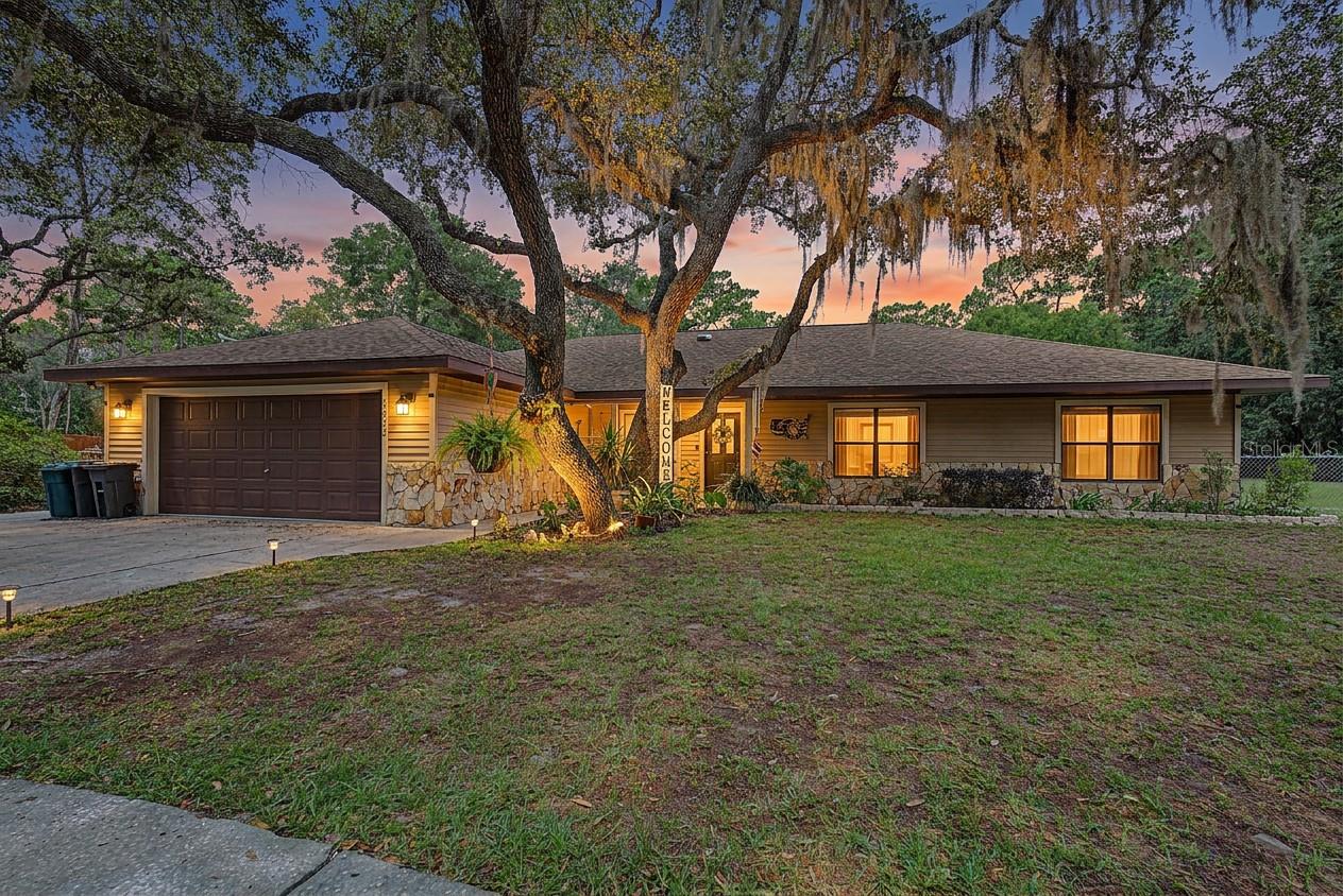 Welcome to your private oasis in the heart of Citrus County! This stunning, solid-block home boasts a seamless, flowing floor plan featuring 4 spacious bedrooms and 2 full baths. As you drive up the concrete circular driveway, you’ll immediately fall in love with the majestic, mature oak trees that frame the property.
Chef’s Delight: A spacious kitchen equipped with double ovens.
Cozy: A fantastic, warm wood-burning fireplace anchors the living space.
Practical: Inside laundry room complete with a utility sink, and French doors that invite the outside in.
Bonus: Sparkling well water (so pure no filter is needed!) and furniture is negotiable to make your move a breeze.
Step through the French doors into your massive, screened lanai—complete with sun shades for ultimate comfort. Dive into the sparkling, oversized in-ground pool or entertain with ease. The fully fenced backyard is a secure haven for "Fido".
Storage Galore & Conveniently Close to boat ramps all on 1.46 Acres
Need space for toys or hobbies? You’ve got a massive 3 bay pole barn plus two extra storage sheds! Located just minutes from premier shopping and major highways, you get country privacy and city convenience.