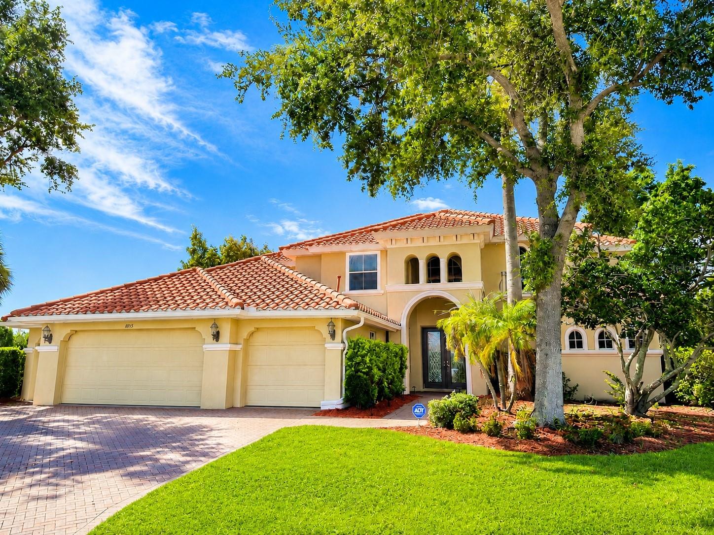 ****SELLER WILL DO OWNER FINANCING with great terms and zero closing costs!**** Luxury Living at a Steal! Welcome to luxurious living in the prestigious community of Waterlefe Golf & River Club! Nestled within this stunning community and surrounded by lush landscaping, this expansive quarters boasts elegance and grandeur at every turn. All it’s waiting for is you to give it the attention it needs with some TLC. As you approach the grand entrance of this executive estate home, you'll immediately be captivated by its majestic presence. Indulge in breathtaking panoramic views from almost every room, as this premium cul-de-sac lot offers wrap-around water and golf course vistas. Step inside to discover a spacious foyer that sets the tone for the opulence that awaits. The formal family room and dining room exude sophistication, perfect for entertaining guests or enjoying intimate gatherings with loved ones. Enjoy the seamless flow between spaces, enhanced by the architectural elegance of dual staircases. The second staircase leads you to the heart of the home - a true chef's dream. Featuring 42" wood cabinets, granite counters, stainless steel appliances, a double oven, and a convenient breakfast bar for casual dining. Entertain guests in style with a wet bar, perfect for hosting gatherings and creating unforgettable memories. Cozy up by the fireplace in the family room off the kitchen, which also offers access to the pool area, ideal for enjoying indoor-outdoor living year-round. No detail has been overlooked in this impeccable residence. Plantation shutters and crown molding add to the charm and allure of the interior. Retreat to the first-floor Owner's Suite and step into luxury - offering a private entrance to the pool area and abundant natural light. Enjoy two large walk-in closets with custom shelving, while the ensuite features dual sinks, a walk-in shower, and a spa-like bath, providing a haven of relaxation and indulgence. Outside, the extended lanai beckons you to unwind in style. Relax on the pavered deck or take a dip in the heated pool/spa with a tranquil waterfall feature, all while soaking in the picturesque surroundings of lush landscaping. Upstairs, discover three well-proportioned bedrooms, each offering ample space and privacy, providing an ideal balance for comfortable living. This generously sized 3 car garage with an extra door for your golf cart, offers ample room for all your vehicles and recreational gear, ensuring convenience and organization for your lifestyle needs. Beyond the confines of this magnificent home, the Waterlefe Community offers an unparalleled lifestyle. With a myriad of amenities including boating, fishing, kayaking, nature trails, and spectacular river views, there's something for everyone to enjoy. Indulge in dining and entertainment opportunities, or simply connect with neighbors in this vibrant and welcoming community. Golf enthusiasts will delight in the championship par 72 course designed by Ted McAnlis, featuring five unforgettable signature golf holes along the Manatee River. With eight different tees catering to golfers of all skill levels, it's the perfect place to hone your skills or simply enjoy a leisurely round amidst breathtaking natural surroundings. Experience the epitome of luxury living in Waterlefe Golf & River Club - where every day feels like a vacation and your dream home awaits.