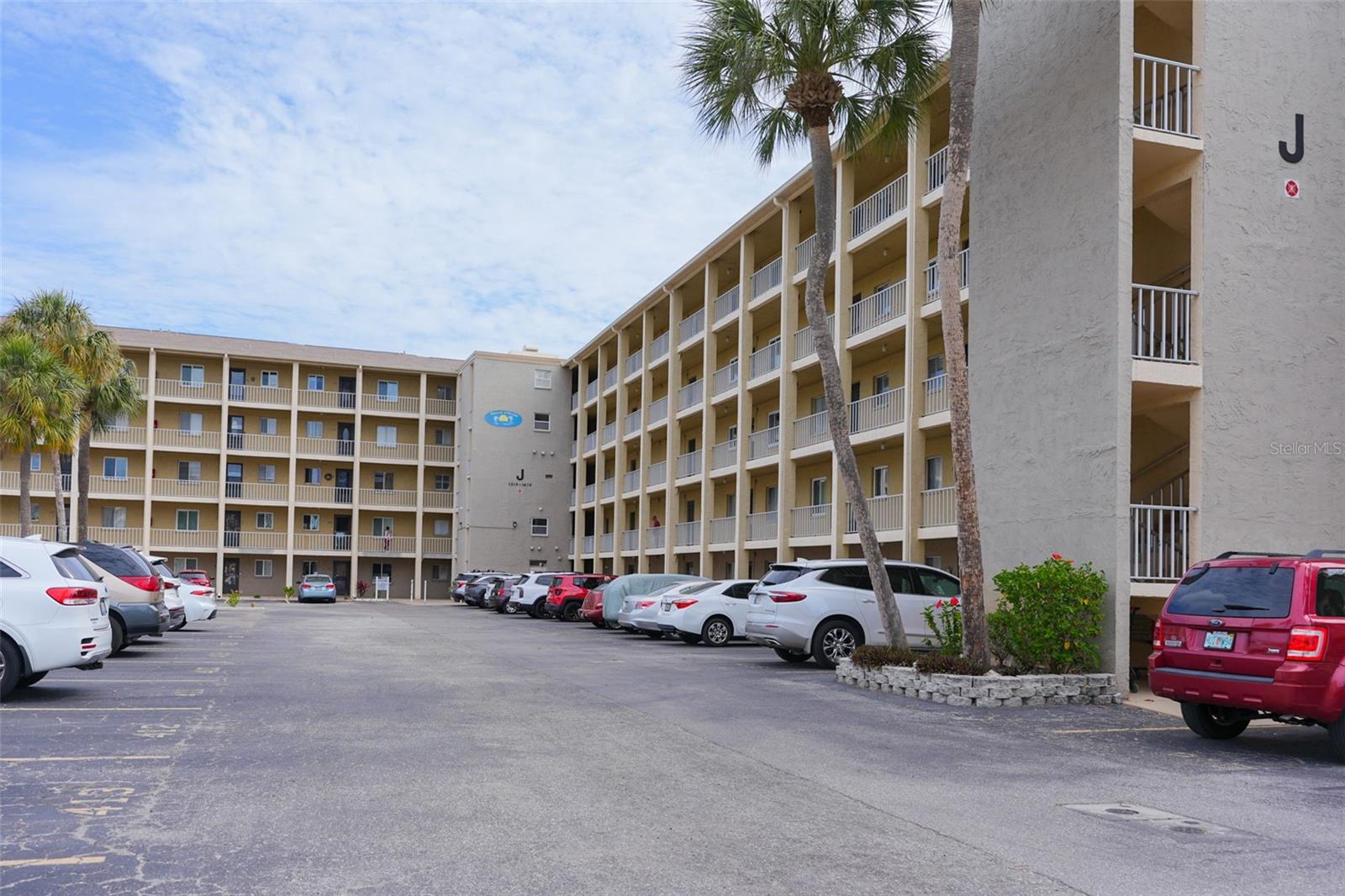 2/1 condo in Bayshore on the Lake in Bradenton. Third-floor lake views, elevator access, 2025 impact windows, Flood Zone X.

Welcome to Bayshore on the Lake, a 55+ waterfront community in Bradenton offering lake views, elevator access, community amenities, and a location convenient to Anna Maria Island, downtown Bradenton Riverwalk, shopping, healthcare, golf, and everyday services. This third-floor, 2-bedroom, 1-bath condominium combines low-maintenance ownership with recent updates and a community designed for comfortable Florida living.

One of the first questions buyers ask is whether the building has an elevator. The answer is yes. This unit is located on the third floor and is served by elevator access. Assigned parking space J312 is conveniently located near the building entrance and elevator, making daily living and seasonal use more convenient. The third-floor location also provides views of Bayshore Lake and the surrounding community.

Buyers often want to know what has been updated. Recent improvements include impact windows installed in 2025, a newer water heater, and vinyl plank flooring throughout the main living areas. The floor plan offers approximately 912 square feet of living space with a comfortable layout that includes a living area, dining space, kitchen with dishwasher, range, and refrigerator, and two bedrooms designed for everyday living.

What does the HOA include? The monthly HOA fee of $569 covers cable TV, internet, water, sewer, trash service, exterior maintenance, grounds maintenance, reserve funding, common area upkeep, and community pool access. The property is located in Flood Zone X, a feature many Florida buyers specifically look for when evaluating ownership costs and long-term planning.

For additional confidence, Building J has completed a professional building assessment and milestone inspection requirements. The engineering report concluded that Building J did not require a Phase 2 inspection at the time of review, and the association reported completion of a roof replacement project with a 25-year warranty. These completed improvements provide added confidence in the community's ongoing maintenance and stewardship.

Residents enjoy access to a heated pool, clubhouse with kitchen, library, covered fishing pier, shuffleboard courts, kayak launch area, grilling space, and car wash station. Whether spending time by the water, enjoying community amenities, or exploring the surrounding area, there are numerous opportunities to enjoy the Florida lifestyle close to home.

Another common question buyers ask is whether the property works well for full-time or seasonal occupancy. Bayshore on the Lake offers ownership opportunities that support both lifestyles while providing a convenient lock-and-leave option for those who spend part of the year in Florida. Community leasing policies and ownership requirements are available through the association for buyer review.

Conveniently located near grocery stores, restaurants, hospitals, urgent care facilities, golf courses, downtown Bradenton Riverwalk, and the beaches of Anna Maria Island, this property offers an attractive combination of location, amenities, recent updates, and value within an established Bradenton waterfront community.