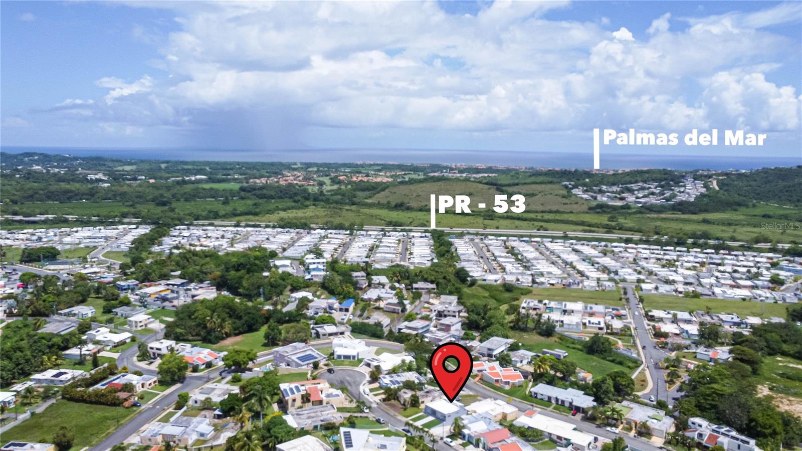 An opportunity to own near Palmas del Mar at a significantly lower price point.  Welcome to 2 Quintas de Candelero, Humacao, PR 00791 — a beautifully updated, two-story single family residence that offers space, style, and serenity. This home features:

4 bedrooms / 3 full bathrooms in roughly 2,096 sq ft of interior living space. 
Recently remodeled with modern finishes throughout, including laminate flooring, granite counters, and stainless-steel appliances. 
An open and bright floor plan: formal living room, dining room, family room, large kitchen, laundry room, and other bonus spaces.
Great lighting with recessed fixtures, large windows, plus storm shutters for added protection and peace of mind. 
Outdoor amenities: a spacious balcony with breathtaking mountain views, garden areas, and a calm cul-de-sac setting that ensures privacy. 
Fenced yard, a storage closet in the carport, and parking for up to 3 cars (attached garage). 
Lot size is approx. 5,193 sq ft, giving good outdoor space without too much maintenance. 
Built in 1998, but with a major remodel in 2025, so many of the key components have been refreshed and modernized. 

This home combines comfort, elegance, and functionality — it’s move-in ready.

Multifamily / Income Potential:
Here’s where this property really stands out for someone interested not just in owning, but in investing or living with flexible use:

The lower level of the property already has a 2 bedroom / 1 bathroom unit with a separate entrance. This configuration opens up multiple possibilities.
With a bit of modification—adding a kitchenette to that lower unit—this could be used as a rental unit, guest/in-law suite, or even for short-term stays.
Because it’s part of the same structure but separated in access, you get the benefit of shared property services (roof, structure, etc.) while maintaining privacy and independent functionality.
This flexibility can help cover mortgage or maintenance costs, add passive income, or offset living expenses, all while retaining a beautiful main living area upstairs.

If you’re interested in touring this home, discussing pricing, or exploring its income possibilities, I’d love to chat. This kind of opportunity doesn’t come around often. 

This property qualifies for FHA Loan, Conventional loan and Seller is willing to do Seller Financing.