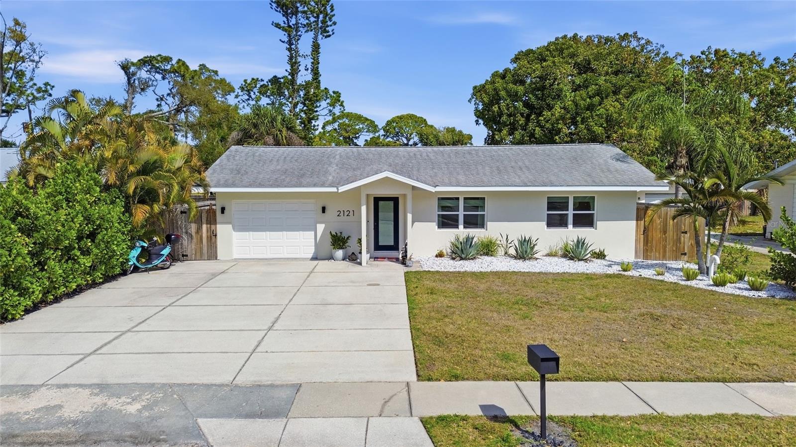 Backyard retreat + income-producing detached studio + steps to Trader Joe’s! Quiet dead-end street near Siesta Key & Downtown Sarasota—privacy meets prime location.

Extensively updated and ideally located, this Sarasota home offers the perfect blend of lifestyle and convenience—just minutes to Downtown, Siesta Key Beach, Sarasota Memorial Hospital, and SRQ Airport.

The private backyard is a true highlight, featuring lush landscaping, custom hardscaping, a pergola, and a striking mural—fully fenced (2023) for privacy and perfect for entertaining or relaxing outdoors year-round.

Inside, the home is move-in ready with fresh paint, custom feature wall, built-in closets, blackout blinds, and hurricane-rated windows and doors for peace of mind and natural light.

The kitchen includes a Bosch dishwasher (2025), Samsung range and microwave (2023), plus LG washer/dryer (2023). Additional upgrades include whole-home water filtration with reverse osmosis (2022), air purification (2024), generator with transfer switch (2025), updated plumbing, maintained HVAC, and a new 28-gallon water heater (2026).

The upgraded garage features waterproof flooring, built-ins, insulation, and mini-split AC (2025)—ideal for a gym, workshop, or flex space.

The detached studio adds exceptional versatility with a private entrance, outdoor space, kitchenette, full bath, washer/dryer, and dedicated AC (2023). The studio has been successfully rented, offering strong income potential or flexibility for guests or a private office.

A rare opportunity combining privacy, flexibility, and a highly desirable Sarasota location. SELLER IS NOW OFFERING $5,000 TOWARDS CLOSING COSTS AND RATE BUY DOWN.