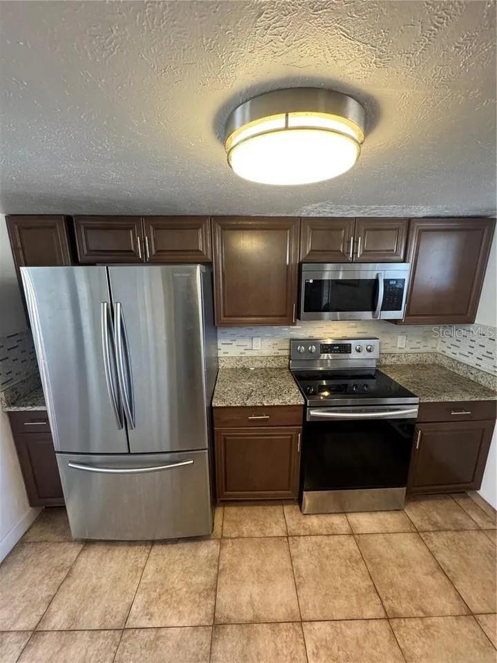 VILLAGE CONDO - Residential Lease