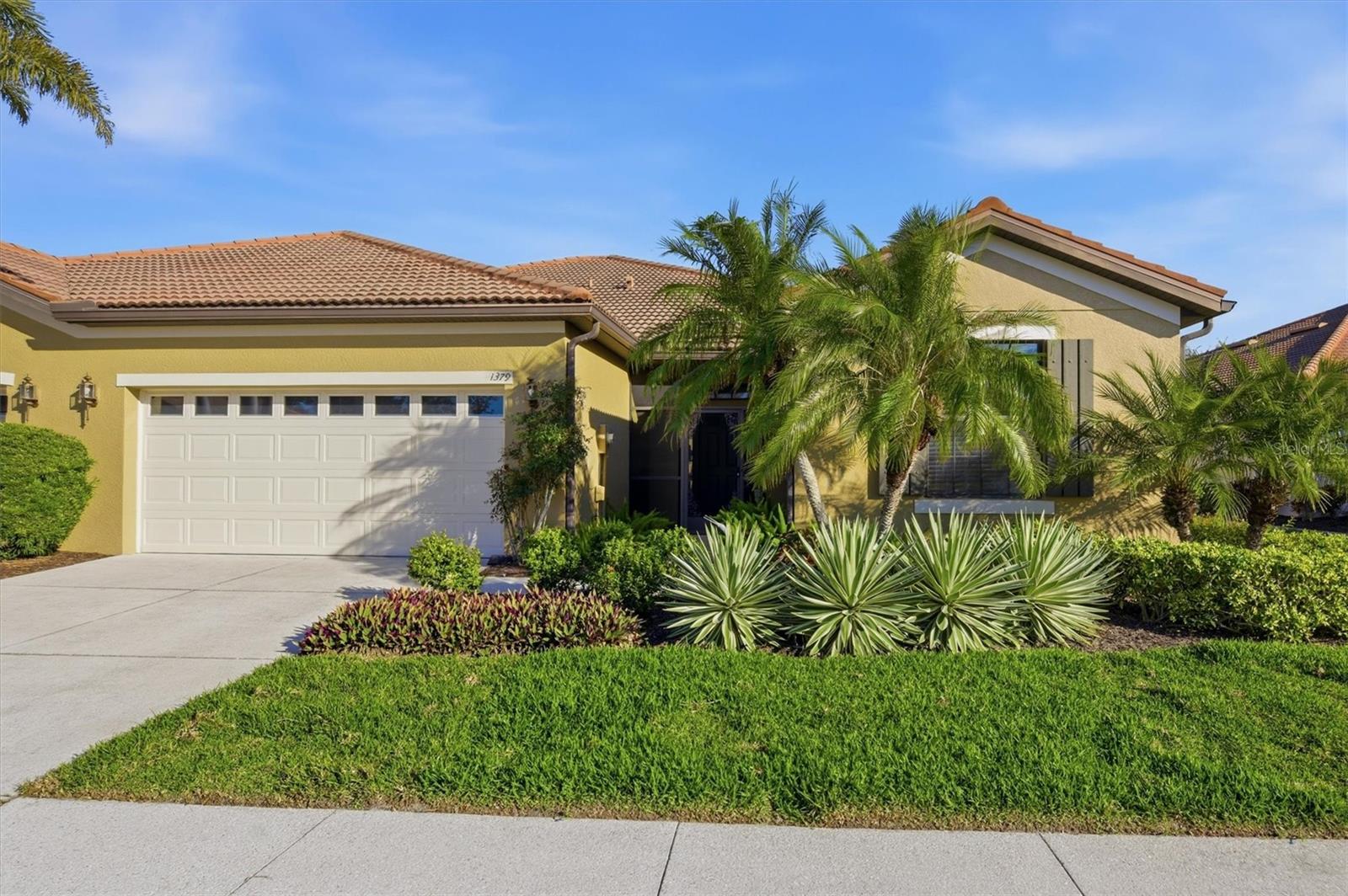 Picture yourself relaxing in this spacious and inviting 3-bedroom home. The back lanai lets you relax with a long pond view of various birds
 and turtles active most of the year. Additionally the villa has a 2-car garage, 2 bathrooms, a den, and a living room/family room oof the island kitchen. It is nestled in an active and vibrant 55+ Venetian Falls community with a spa like community pool and Fitness Center.
 Boasting very low HOA fees and no CDD's this gem offers a sunlight filled interior  with a neutral palette and rounded corners for a soft, modern feel. The large den/flexroom, complete with elegant tray ceiling, provides versatile space for a home office, gym or hobby area. Step into the refreshed kitchen featuring brand new appliances and a charming farmhouse style sink, perfect for culinary adventures.
The primary bedroom exudes warmth with rich wood flooring and a freshly updated bath, while the guest bedroom enjoys new carpeting.
Practical upgrades include UV film on windows and sliders for energy efficiency, pebble flooring on the lanai and accordion shutters across
the rear for easy storm protection and secure storage of patio furniture. Some rooms are virtually staged. Relish peaceful, long lake views
from the eastern exposure enjoyable at any time of day. The community shines with a fabulous Clubhouse, onsite management, social calendar that includes dancing, concerts, cards and various group activities. Amenities and active lifestyle make this home a true retreat in
 Paradise.