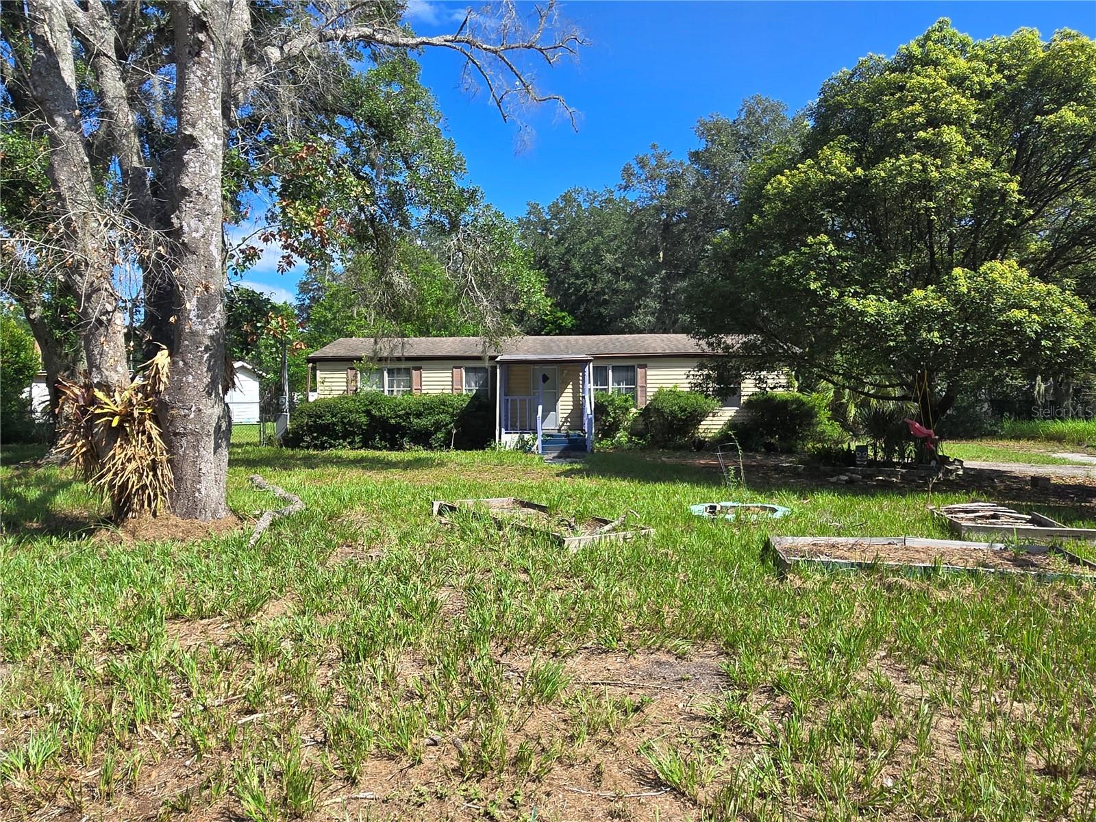Looking for a peaceful retreat with endless possibilities? This 3-bedroom, 2-bath home sits on .43 acres at the end of a quiet cul-de-sac, offering privacy and room to grow. Centrally located just off FL-60, the property provides convenient access to Lakeland, Plant City, Bartow, and Tampa, along with shopping, dining, schools, and major roadways the perfect balancing quiet, rural living with everyday convenience. Recent updates include a 2022 A/C and updated plumbing. NO HOA and not located in a flood zone, this property offers flexibility and peace of mind. The home is being sold AS-IS. Don’t miss the opportunity to own a spacious lot in a desirable, centrally located setting.