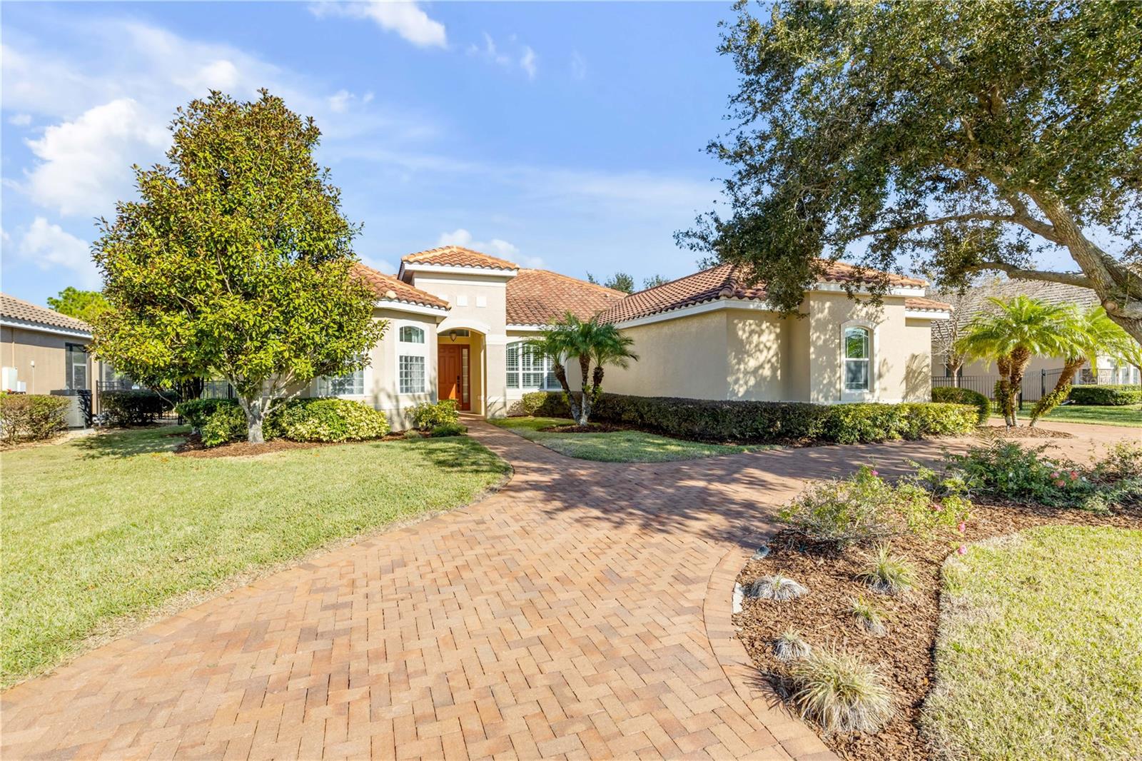 Waterfront home with pool located in the gated community of Loch Leven. This 5-bedroom, 4-bath property features a side-entry three-car garage with a Tesla charger, a kitchen with granite countertops, stainless steel appliances, double ovens, and upgraded cabinetry, plus an adjacent bar area. The first-floor primary suite includes a sitting area, soaking tub, granite countertops, and a walk-in shower. The second floor has been reconfigured to include two bedrooms and a living area. Carpets have been recently cleaned.

Recent updates include a new water heater (2024), a new dishwasher (2025), a new salt cell, a new pool pump, and a leased 200-gallon propane tank. Additional features include a whole-house water filtration system, a separate drinking-water filtration system, dual-zone A/C, granite in all bathrooms, a security system, and laundry room cabinetry. Outdoor features include a self-cleaning pool, spa, child-safety fencing, a lanai wired for surround sound, and a fenced backyard with a play area. Flood insurance is not required.

Loch Leven offers gated access and is minutes from downtown Mount Dora, with convenient access to Orlando, New Smyrna Beach and Ocala.