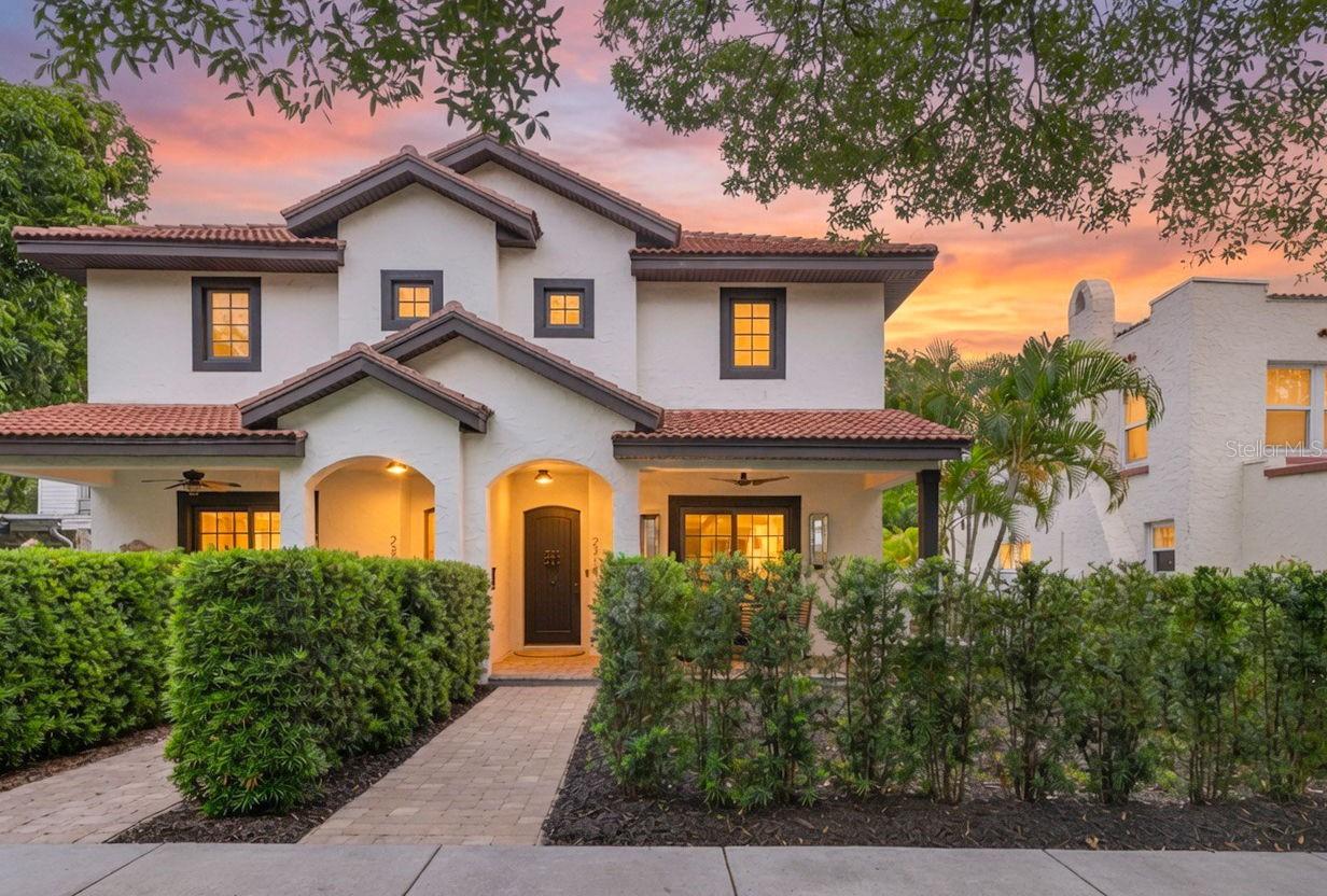 Experience refined urban living at 2319 7th Street North, a stunning Mediterranean-inspired residence nestled along the charming tree-lined streets of Crescent Heights—one of St. Petersburg’s most coveted neighborhoods. Known for its elevated terrain, Crescent Heights is among the highest areas in the city, making it especially desirable for its NON-FLOOD ZONE and NON EVACUATION ZONE status and the added benefit of no flood insurance requirement. Built in 2016, this exceptional residence offers the peace of mind that comes with newer construction, featuring solid block construction and hurricane-impact windows designed to enhance both durability and energy efficiency. Combining quality craftsmanship with modern building standards, this home provides confidence and comfort for years to come.

Located JUST ONE BLOCK TO CRESCENT LAKE Park, residents enjoy easy access to illuminated tennis courts, a dog park, playground, scenic walking and jogging trails, and expansive green spaces that provide a peaceful retreat in the heart of the city.

Inside, this beautifully updated two-story home showcases soaring 10-foot ceilings, rich wood flooring, and a light-filled open-concept design that seamlessly blends comfort and sophistication. The chef’s kitchen is a true showpiece, featuring custom solid wood cabinetry, luxurious granite countertops, an oversized center island, GAS RANGE, second wall oven, custom built-ins, and abundant storage. Thoughtfully designed for both everyday living and entertaining, this exceptional space combines timeless elegance with outstanding functionality. A cheerful powder bath on the main level adds convenience for guests.

Designed for effortless entertaining, the spacious living and dining areas are bathed in natural light and open to the welcoming front porch through sliding glass doors. Tucked away off the rear hallway, the private tropical courtyard creates a tranquil outdoor oasis ideal for morning coffee, evening cocktails, or quiet relaxation. Just beyond, an open pavered side yard has already been plumbed for a hot tub, offering the opportunity to create your own private spa retreat.

Upstairs, the luxurious primary suite serves as a serene sanctuary, complete with a beautifully renovated spa-inspired bathroom featuring premium finishes, designer fixtures, and carefully curated details throughout. Two generously sized guest bedrooms provide comfortable accommodations for family and visitors and are complemented by a recently updated secondary bathroom showcasing stylish finishes and modern design.

Additional highlights include alley access, ample guest parking, and an oversized two-car garage with abundant overhead storage—an increasingly rare feature in such a prime location.

Situated just over a mile from vibrant Downtown St. Petersburg, you'll enjoy convenient access to waterfront parks, award-winning restaurants, art galleries, museums, live entertainment, professional sporting events, and the city's thriving cultural scene.

This is a rare opportunity to own a beautifully updated home in one of St. Petersburg’s most sought-after neighborhoods, where Mediterranean charm, modern luxury, and an exceptional location come together to create an unparalleled lifestyle.