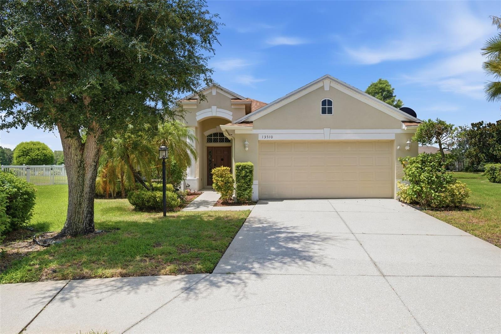 Welcome to your move-in-ready dream home, perfectly tucked away on a quiet cul-de-sac in one of Lakewood Ranch’s most desirable communities—Greenbrook Village. This beautifully updated and meticulously maintained residence offers the ideal blend of comfort, style, and functionality. Featuring 3 bedrooms, 2 bathrooms, plus a versatile den/office—or optional 4th bedroom—this home is designed to fit today’s lifestyle. The spacious primary suite serves as a true retreat, complete with a fully remodeled en-suite bath showcasing a walk-in shower, double sink vanity, and a generous walk-in closet. Two additional bedrooms share a well-appointed full bath with double sinks and a tub/shower combination—perfect for family or guests. At the heart of the home, the stunning open-concept kitchen has been tastefully updated with custom cabinetry, gorgeous granite countertops, abundant prep space, a spacious pantry, and a gas stove. It flows seamlessly into the main living areas, making everyday living and entertaining effortless. A formal dining room and a charming breakfast nook provide flexible dining options for any occasion. The bright floor plan features high ceilings and sliding glass doors that flood the space with natural light. An indoor laundry room with a washer and dryer adds everyday convenience. Step outside onto your extended screened-in lanai, where you’ll enjoy peaceful pond views and beautiful Florida sunrises—perfect for morning coffee or relaxing evening gatherings. Additional highlights include a 2-car garage, water softener, hurricane shutter panels, and a newer roof—offering both comfort and peace of mind. Major updates have already been completed, including a newer roof, a newer HVAC system, and 2026 interior paint. Enjoy exceptional value with an ultra-low annual HOA fee of just $121, a low CDD fee, and no flood insurance required—a rare and highly desirable combination in Lakewood Ranch. Ideally located near top-rated schools, this home is just minutes from Greenbrook Adventure Park, where you’ll find nature trails, playgrounds, sports courts, a dog park, and picnic areas. Plus, you’re close to I-75, UTC shopping, Costco, golf courses, Sarasota Memorial Hospital, Premier Sports Campus, airports, and the world-renowned Gulf beaches, including Siesta Key. This home truly captures the Florida lifestyle—peaceful, convenient, and ready for you to enjoy. Hablo Español.