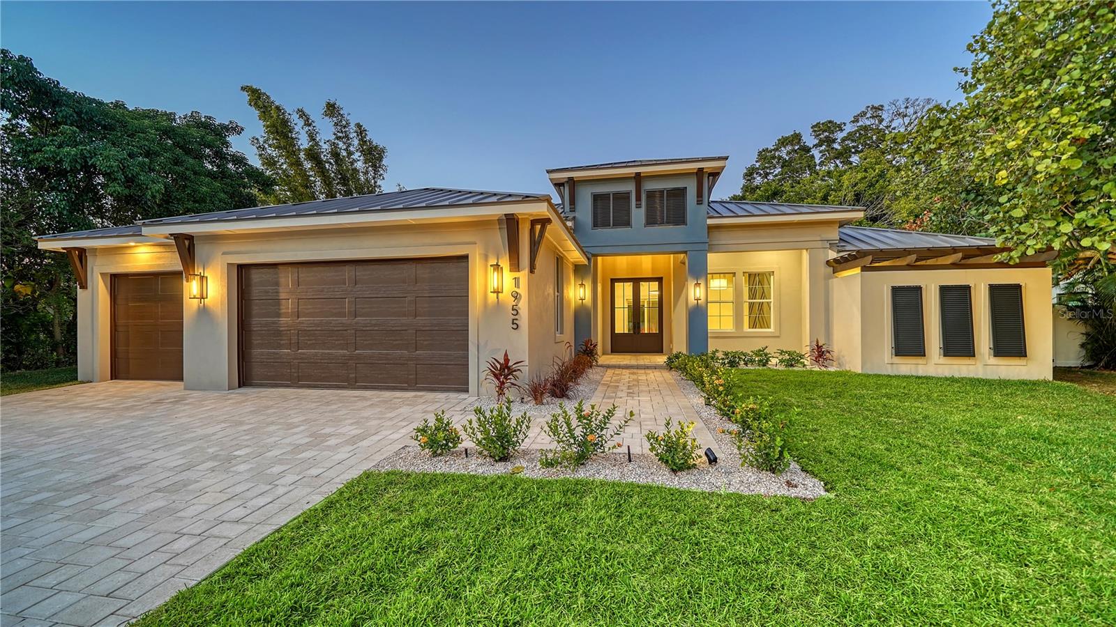 Welcome home to 1955 Datura Street, a brand-new single story Model West of the Trail by Majestik Homes, newly constructed and move-in ready. Step into your expansive great room, where a kitchen island made for holidays and unforgettable memories borders a chef’s dream kitchen with a professional range and built-in appliances. The open and bright dining room is supported by a large bar and looks out onto your white shell paver deck and pristine pool. Tall ceilings and wood-matched details catch your eye on your way to your master suite, boasting a standing tub and a large walk-in, volume-controlled rain head shower system. Custom-controlled lighting and chandelier bring together the artful wall and ceiling details of the impressive master bedroom. Beyond the master suite is a thoughtfully designed office space that provides a tranquil environment for work or study. Outside, your own private oasis awaits, featuring a discreet outdoor shower, and ample outdoor living space for basking in the Florida sun surrounded by tasteful palms and mature trees. Ideally situated, 1955 Datura Street is a gateway to Sarasota's most sought-after destinations. Immerse yourself in the vibrant culture of downtown Sarasota, where gourmet dining, entertainment, and boutique shopping are just around the corner at Southside Village. When you're ready to unwind, Siesta Key Beach, renowned for its sugary white sands, is a short drive away. This is more than just a home; it's a gateway to Sarasota's most exciting experiences. Live the life you've imagined at 1955 Datura Street, where modern elegance meets local charm. Don't miss your chance to make this exceptional property yours. **Some Photos are Virtually Staged**