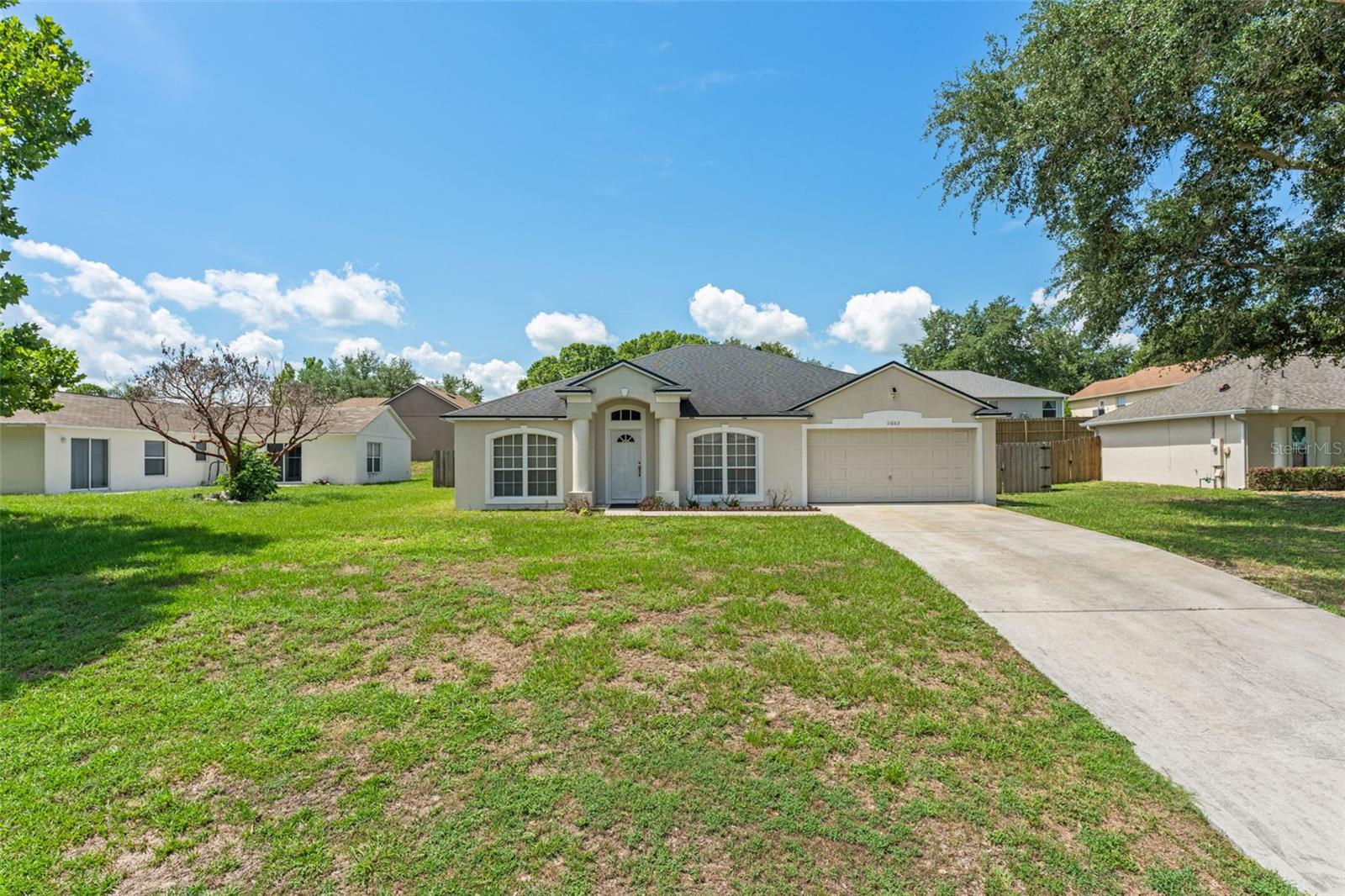 **This house comes with a REDUCED RATE through the seller's preferred lender. This is a lender-paid rate buydown that reduces the buyer's interest rate and monthly payment.**

Welcome to 11603 Pineloch Loop in Clermont, a 3-bedroom, 2-bath home designed for comfortable everyday living.

This one-story residence offers an open floor plan that connects the main living areas for an easy flow between relaxing, dining, and entertaining. The home includes both a living room and a family room, giving the layout added flexibility for everyday lounging, hosting guests, a media space, play area, or work-from-home setup.

The 3-bedroom layout provides room for residents, visitors, a home office, or hobby space, while two full bathrooms support daily convenience. The floor plan offers practical spaces that can be arranged around a variety of needs.

Outdoor living includes a private yard open for personalization. The backyard offers room for seating, gardening, pets, play, or future landscaping and outdoor improvements, giving buyers the opportunity to create a space that fits their lifestyle.

Located in Clermont, the home is close to shopping, dining, schools, parks, lakes, and everyday conveniences. The area is known for its rolling hills, outdoor recreation, lake access, and convenient routes to Winter Garden, Orlando, and surrounding Central Florida destinations, making it a practical location for buyers seeking neighborhood comfort with nearby amenities.