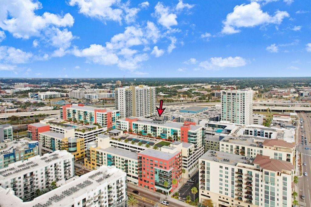 Live in the heart of it all at Grand Central, where this one-bedroom condo pairs modern comfort with an unbeatable Channelside address. Wake up to views of Madison St Park right outside your window, complete with pickleball courts, shuffleboard, and a dog park just steps away.
This building doesn't skimp on lifestyle perks: round-the-clock security, two resort-style pools, an outdoor grilling area, a well-equipped fitness center, and a clubhouse ready for hosting friends and family. Your condo fee takes care of water, sewer, trash, gas, and AC maintenance, so a lot of the guesswork of homeownership is already handled.

Location-wise, you're set. Publix, Starbucks, CVS, and Crunch Gym are all an easy walk away, along with a great lineup of local restaurants. Channelside and Water Street are right next door, Amalie Arena and Sparkman Wharf are perfect for game nights or waterfront hangouts, and if you love to cruise, the Port of Tampa is practically around the corner.

Step inside and you'll notice the ceilings first — soaring at 9'6", paired with oversized windows that keep the space bright all day. The kitchen is where this unit really shines: quartz counters, custom wood cabinetry, a breakfast bar for casual meals, and a full Viking stainless steel appliance package, gas range included. An in-unit washer and dryer round out the everyday conveniences.

Beyond the building, the neighborhood delivers — think Cena Italian, Ginger Beard Coffee, The Poké Company, and Massage Envy, plus a monthly food truck rally that turns the block into a mini festival. An assigned parking space is included for easy, stress-free coming and going.
This is city living done right — book your showing and see Grand Central for yourself.