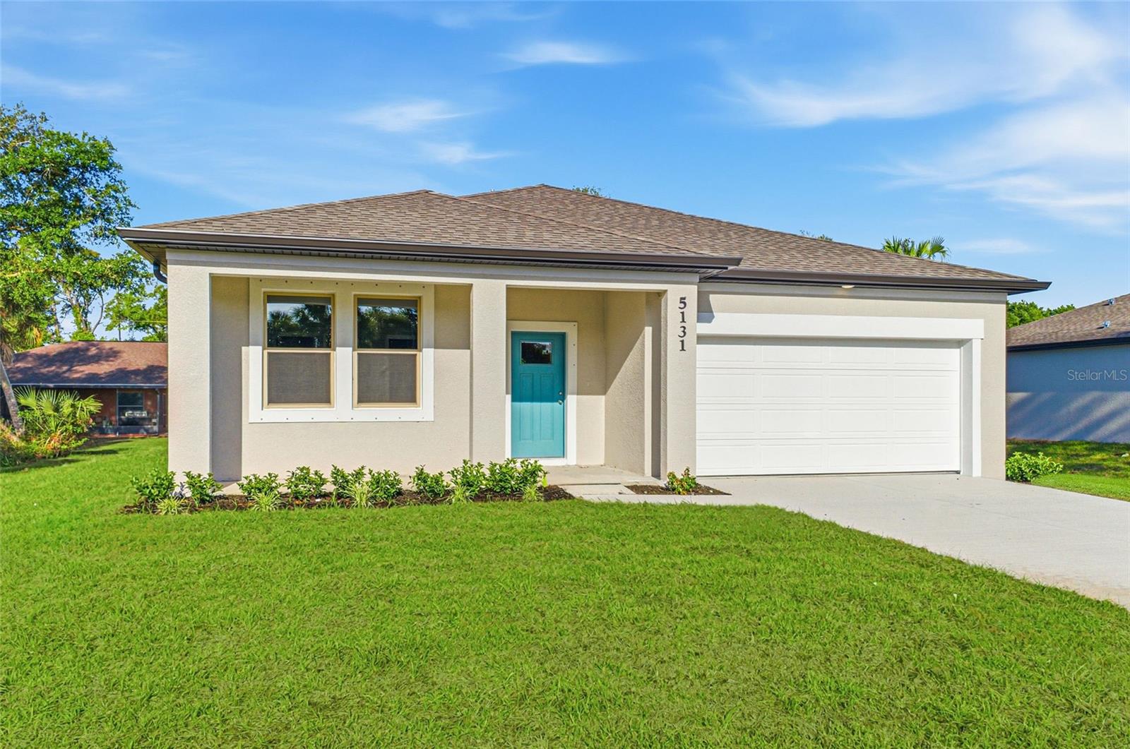 One or more photo(s) has been virtually staged. One or more photo(s) has been virtually staged. This is the last of the Athens floor plans being built in North Port that will be priced under $300,000. Move in Ready Resibuilt Homes has a brand new construction home with city water and septic in North Port and no HOA! This affordable new home is almost ready for you and just what you are looking for in a new home This open floor plan has a large main living area with the kitchen, dining area, and living room all open to each other, with large windows and sliding glass doors providing plenty of natural light. The kitchen space is open with a desk area and another area for a dining table. The dining area is spacious and has access to a sliding glass door to the covered back porch and the living room features multiple LED lights giving the home bright lighting. With almost 1600 square feet of living area, this floor plan is larger than you might imagine with 3 bedrooms, 2 full bathrooms, and a 2-car garage. The front of the home offers a large covered front porch that leads you into a spacious foyer leading you to the open living area. The main living area has a large living room with picture windows and it's open to the large dining room. The dining room has sliding glass door with  access to the back lanai.  The open plan continues into the spacious kitchen which features stainless steel appliances, Shaker-style cabinets with crown molding, decorative hardware and beautiful granite countertops. It also boasts a large island with additional seating and built in desk area. The master bedroom is spacious with large windows bringing in natural light, a tray ceiling and features an en-suite bathroom with a tiled shower, glass enclosure, double vanity with granite countertops and a large walk-in closet. Located on the opposite side of the house are the two guest bedrooms that share a full bathroom with the same beautiful cabinetry and granite countertops. The home includes luxury vinyl plank flooring in the main living area and wet areas for durability and comfort. You'll love them as they are easy to maintain and a trending design element in new homes. Other features include 5" baseboards, gutters, a garage door opener, R38 insulation, 16 SEER air conditioning, LED lighting, and more. Not only do get a luxury home to enjoy, but you also have a home that will allow you to enjoy the Florida lifestyle with the outdoor living with the front porch and rear covered back porch