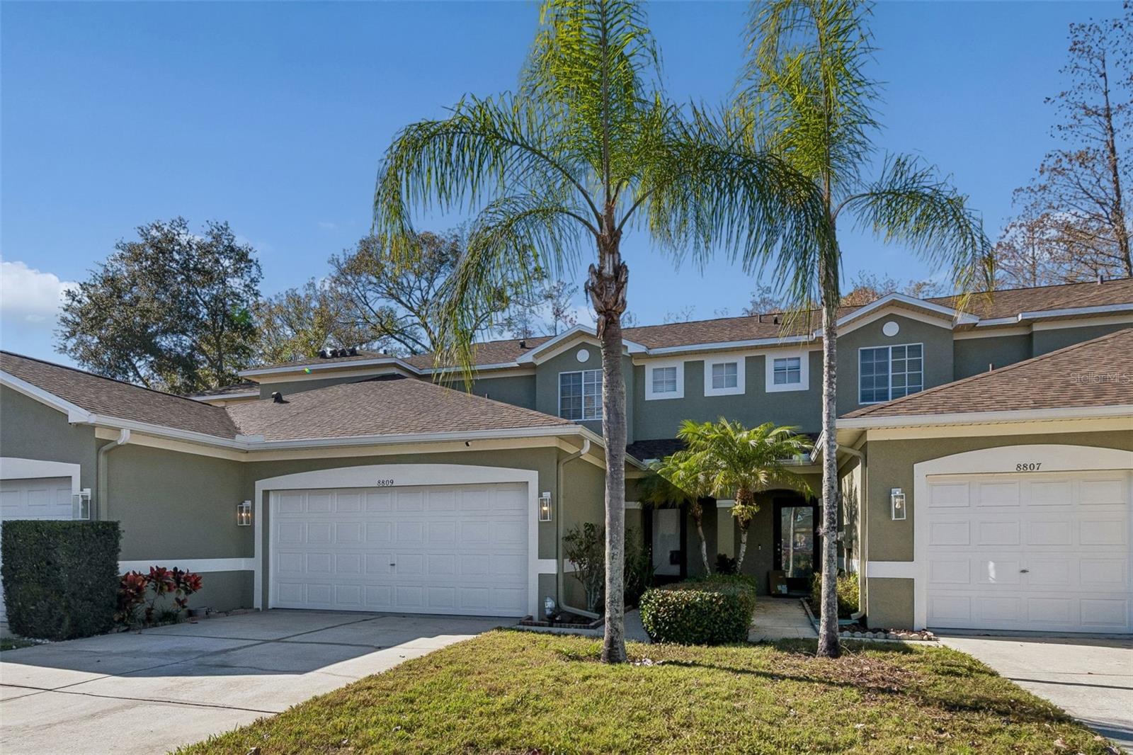 Beautiful Townhome in a Serene Community!
This well-maintained 2-bedroom, 2.5-bath townhome with a bonus room and 2-car garage offers 1,374 sq. ft. of comfortable living space built in 2001.  The home features new tile flooring throughout the living room, dining room, kitchen, foyer, laundry room, and all bathrooms. The stairs and second floor showcase luxury vinyl flooring, adding a modern touch. A downstairs bonus room with double doors provides flexible use as a home office, den, or additional living space. Additional highlights include ceiling fans, light fixtures, blinds, a 2022 water heater, 2022 HVAC system, and a 2026 garage door opener with a 2-car garage. Upstairs, you’ll find two spacious bedrooms, each with its own private bathroom and walk-in closet. Enjoy outdoor living on the brand-new 2026 wood deck off the living room, overlooking peaceful conservation views, along with a covered front porch and ample guest parking. Casa Blanca is a charming, small townhome community featuring beautiful landscaping, ponds with fountains, and surrounding conservation. Residents enjoy a nature trail leading to the private community pool. HOA fees conveniently include roof maintenance, water, exterior insurance, lawn care, and pool access.  Ideally located just minutes from Citrus Park Mall, restaurants, Veterans Expressway, and A-rated schools, with a short drive to Tampa International Airport, downtown Tampa, and area beaches.  Step inside this beautiful townhome—you won’t be disappointed.